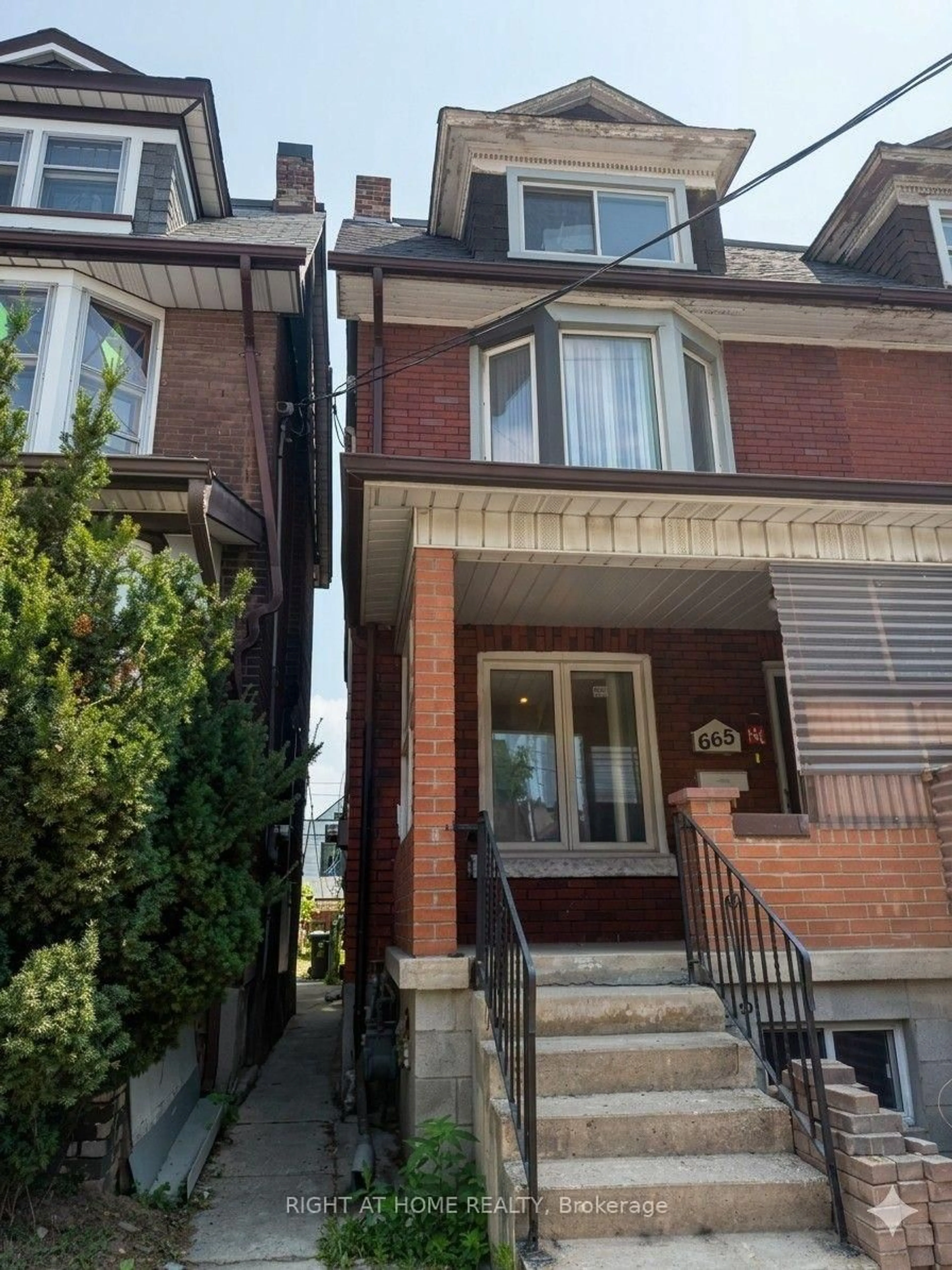 Home with brick exterior material, street for 665 Ossington Ave, Toronto Ontario M6G 3T6