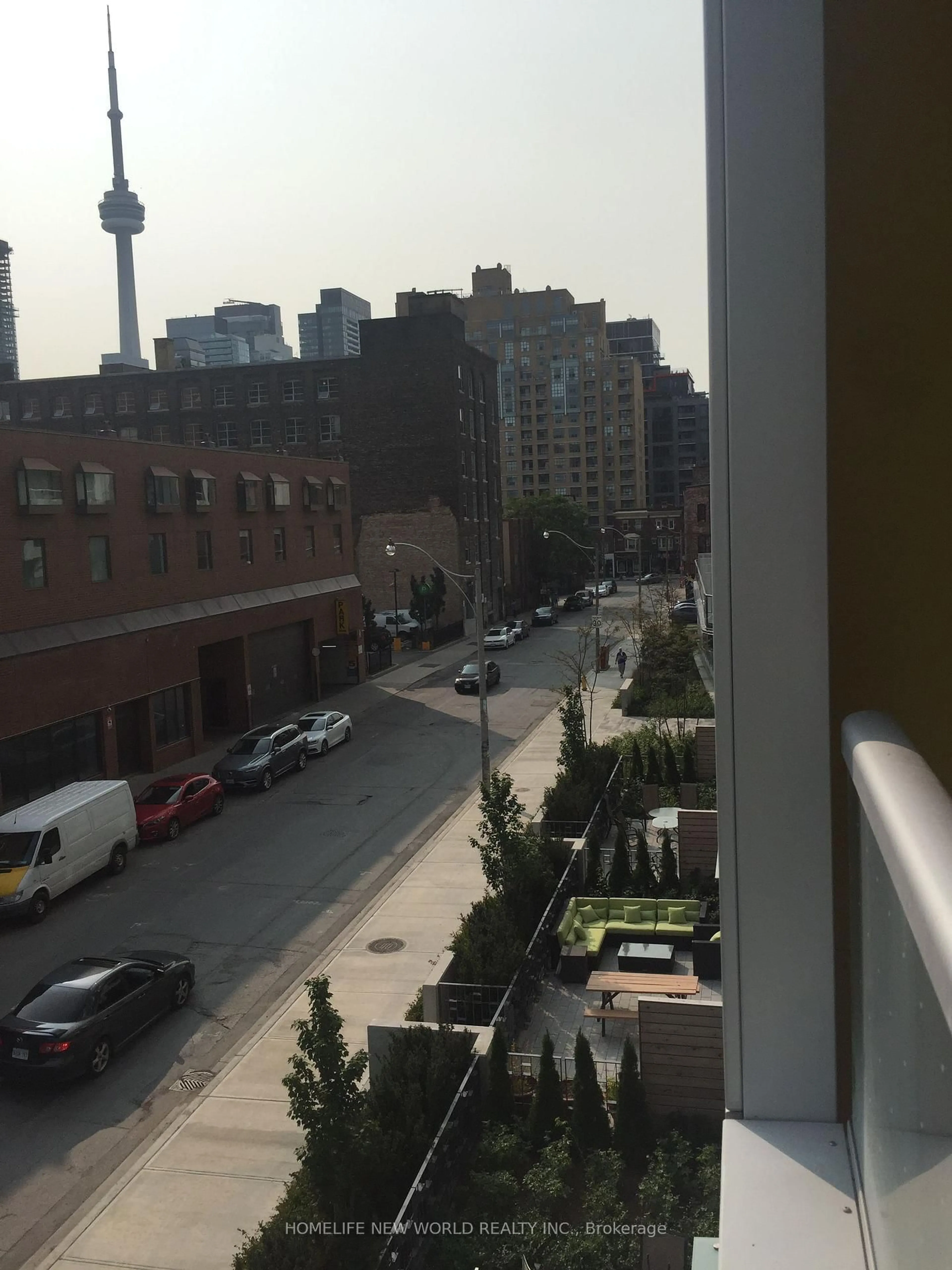 Balcony in the apartment, city buildings view from balcony for 38 Cameron St #308, Toronto Ontario M5T 0C3