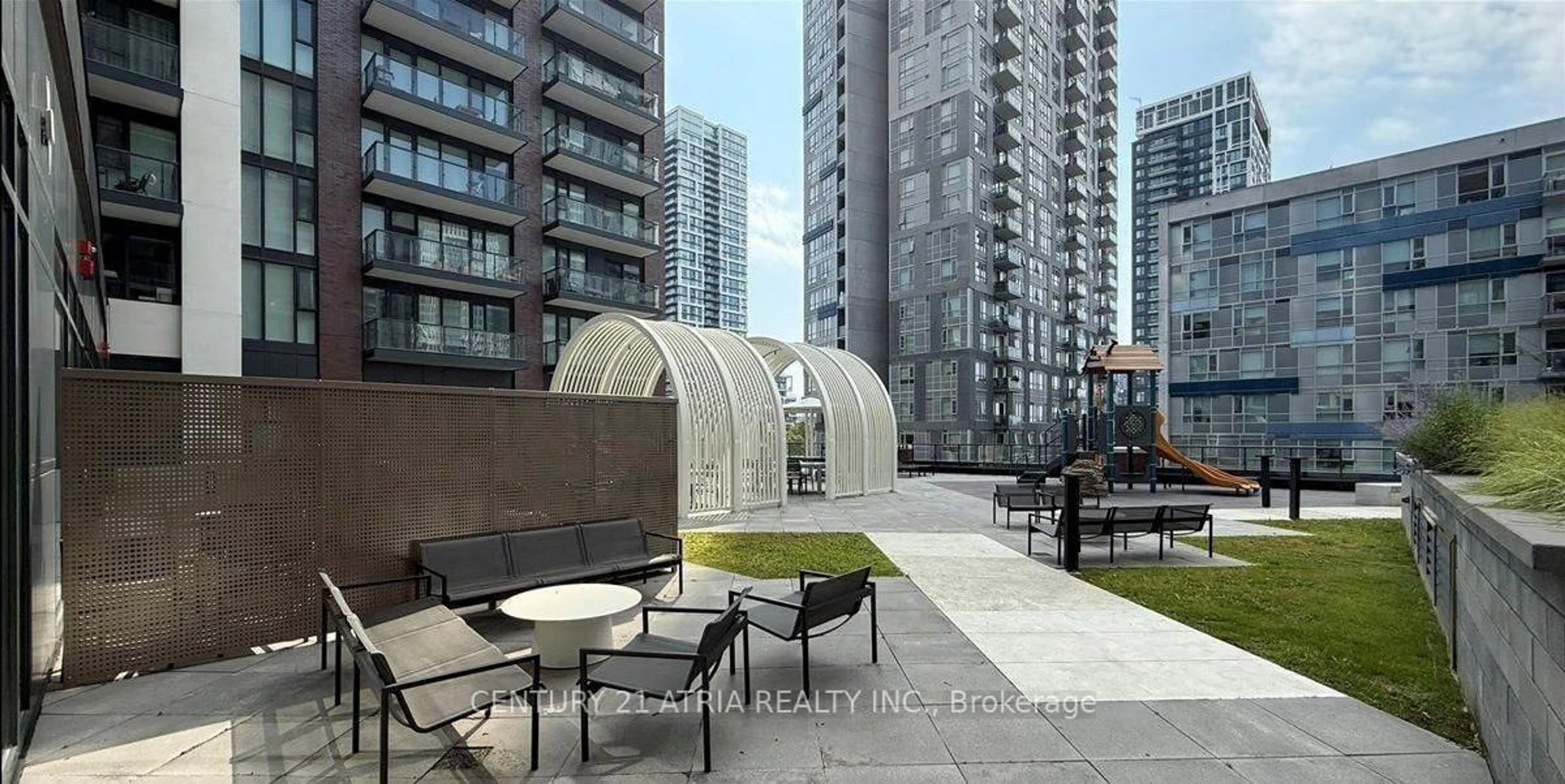 Patio, city buildings view from balcony for 130 River St #2010, Toronto Ontario M5A 0R8
