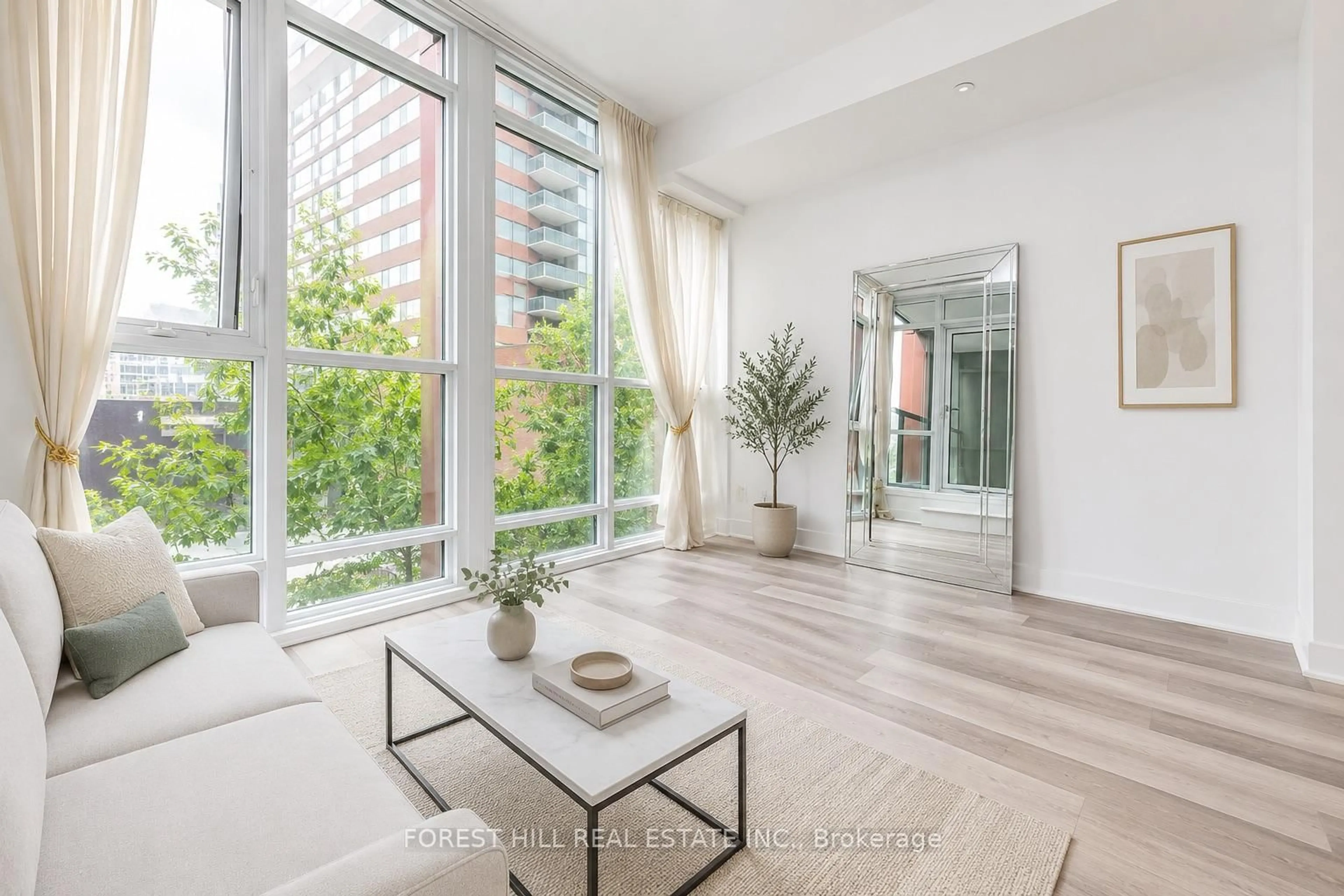 Living room with furniture, unknown for 32 Davenport Rd #306, Toronto Ontario M5R 0B5