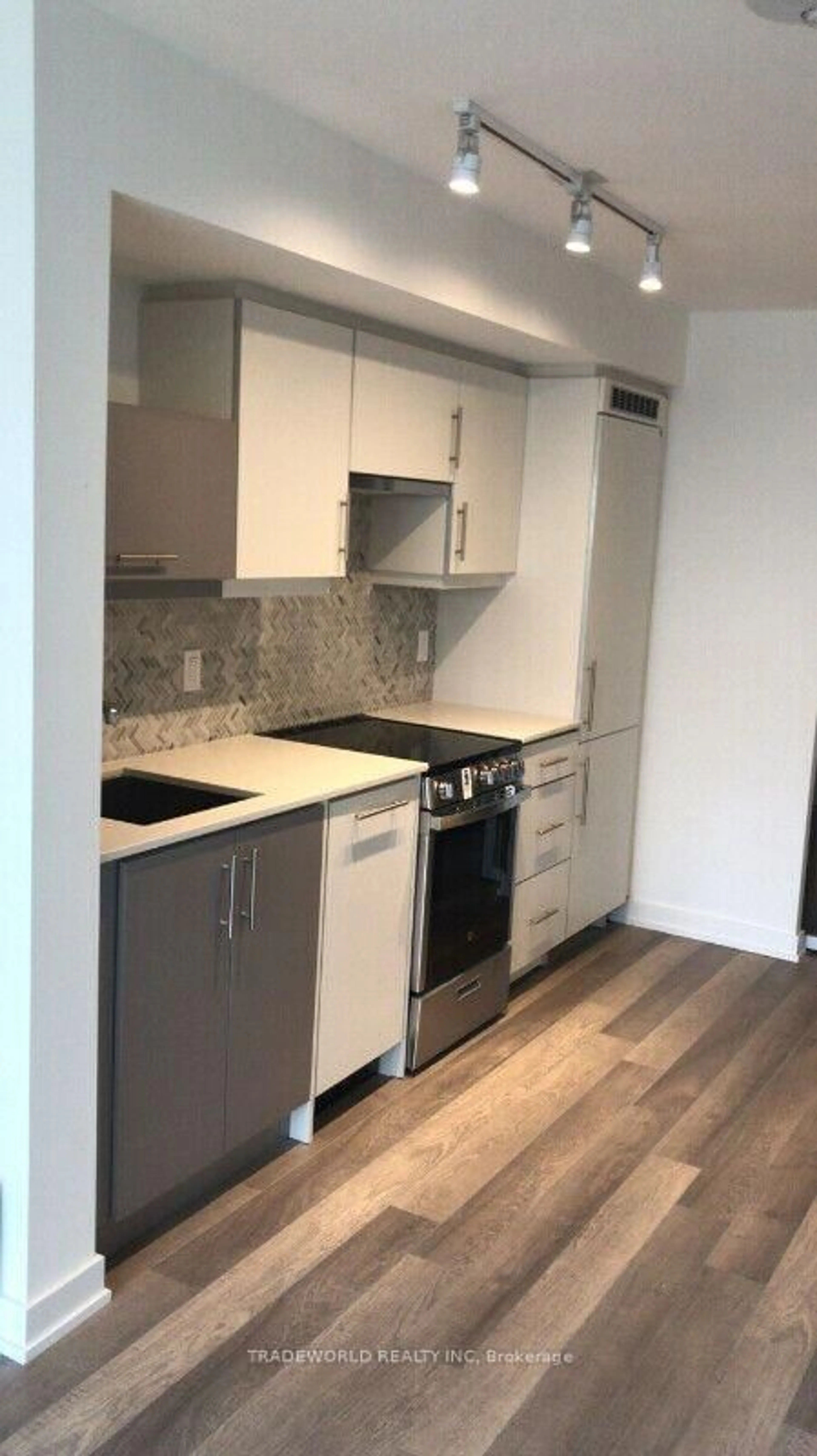 Standard kitchen, wood/laminate floor for 181 Huron St #707, Toronto Ontario M5T 0C1