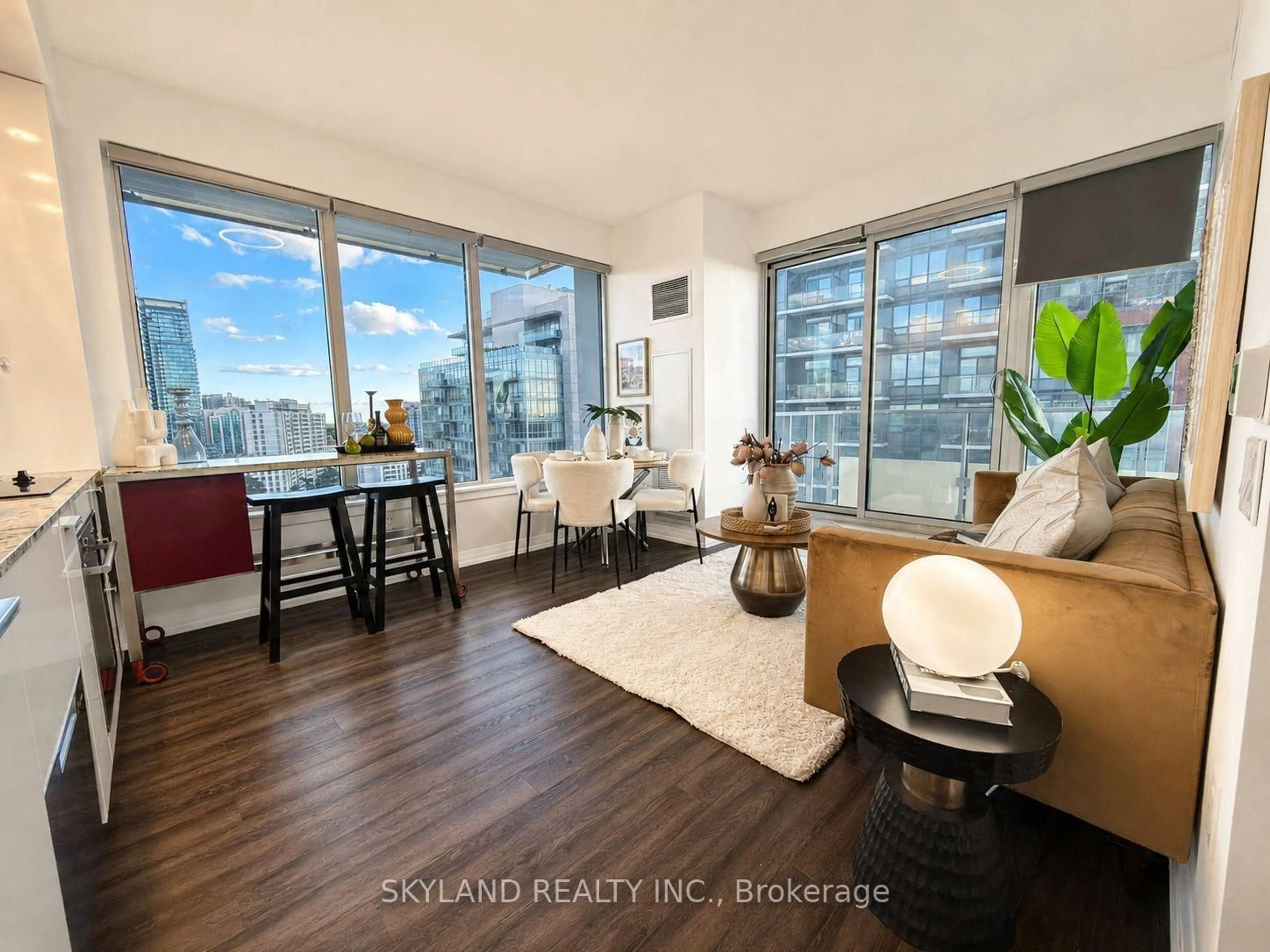 Living room with furniture, wood/laminate floor for 75 Canterbury Pl #1607, Toronto Ontario M2N 2N1