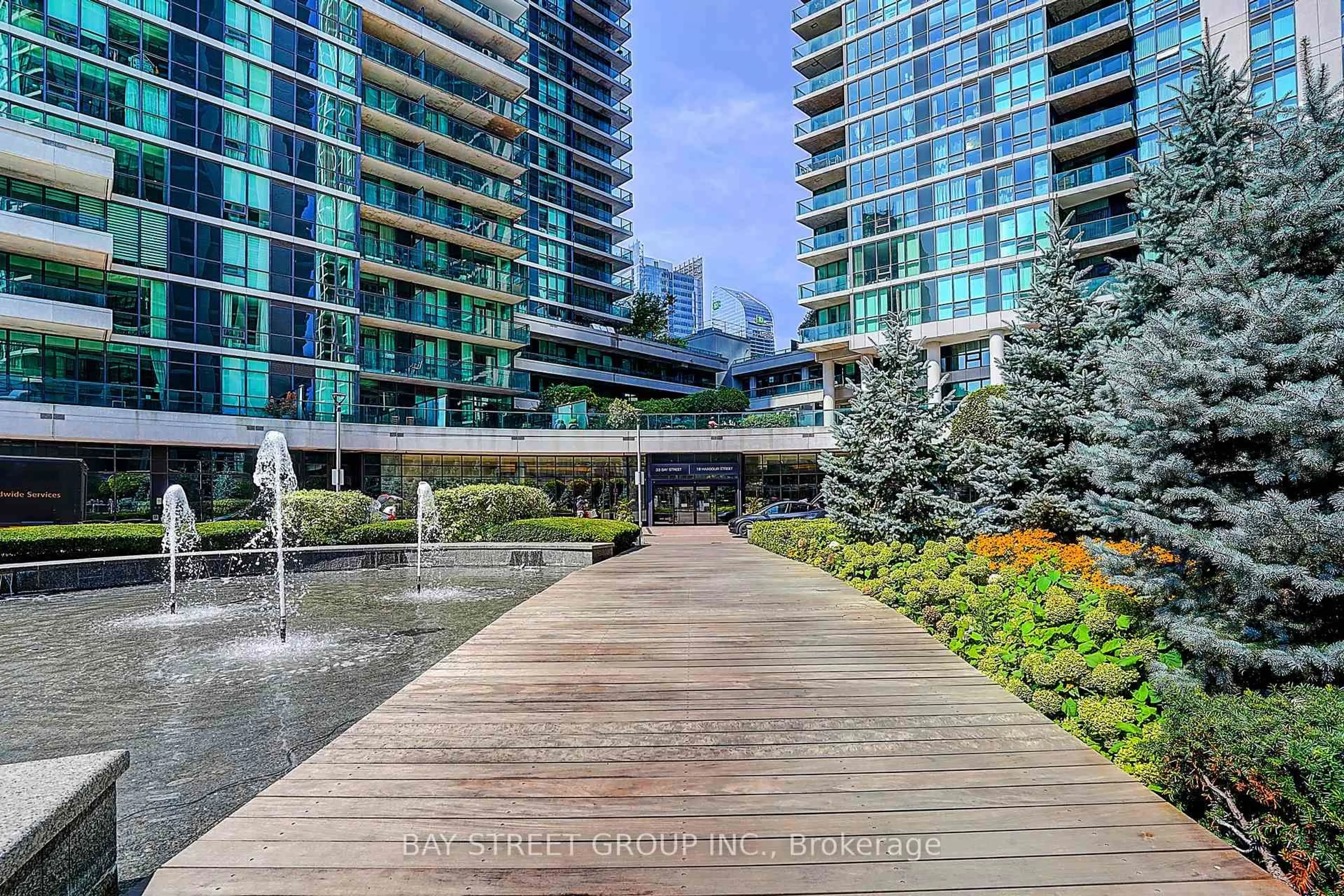 Patio, city buildings view from balcony for 33 Bay St #3310, Toronto Ontario M5J 2Z3