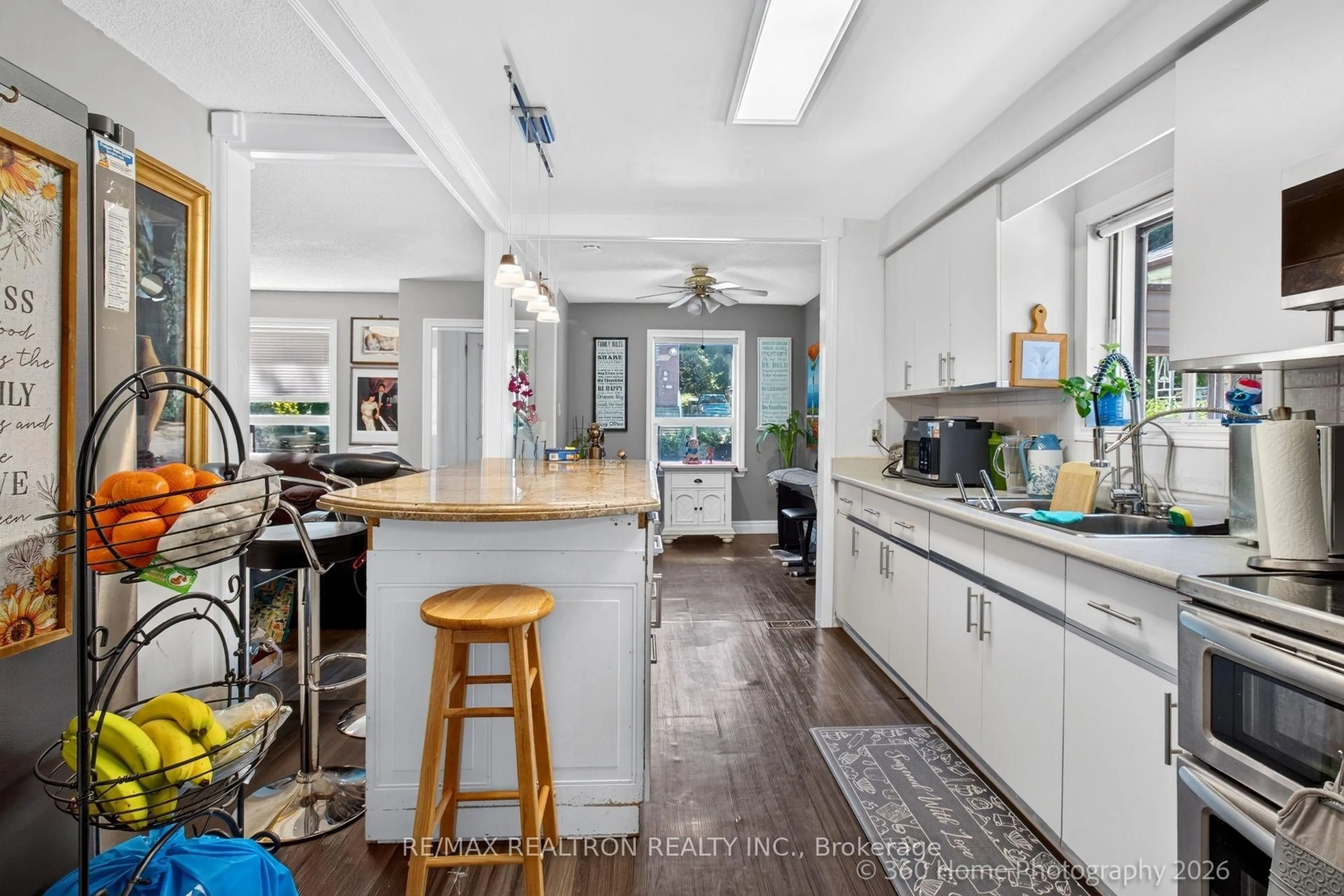 Open concept kitchen, ceramic/tile floor for 84 Ranee Ave, Toronto Ontario M6A 1N2