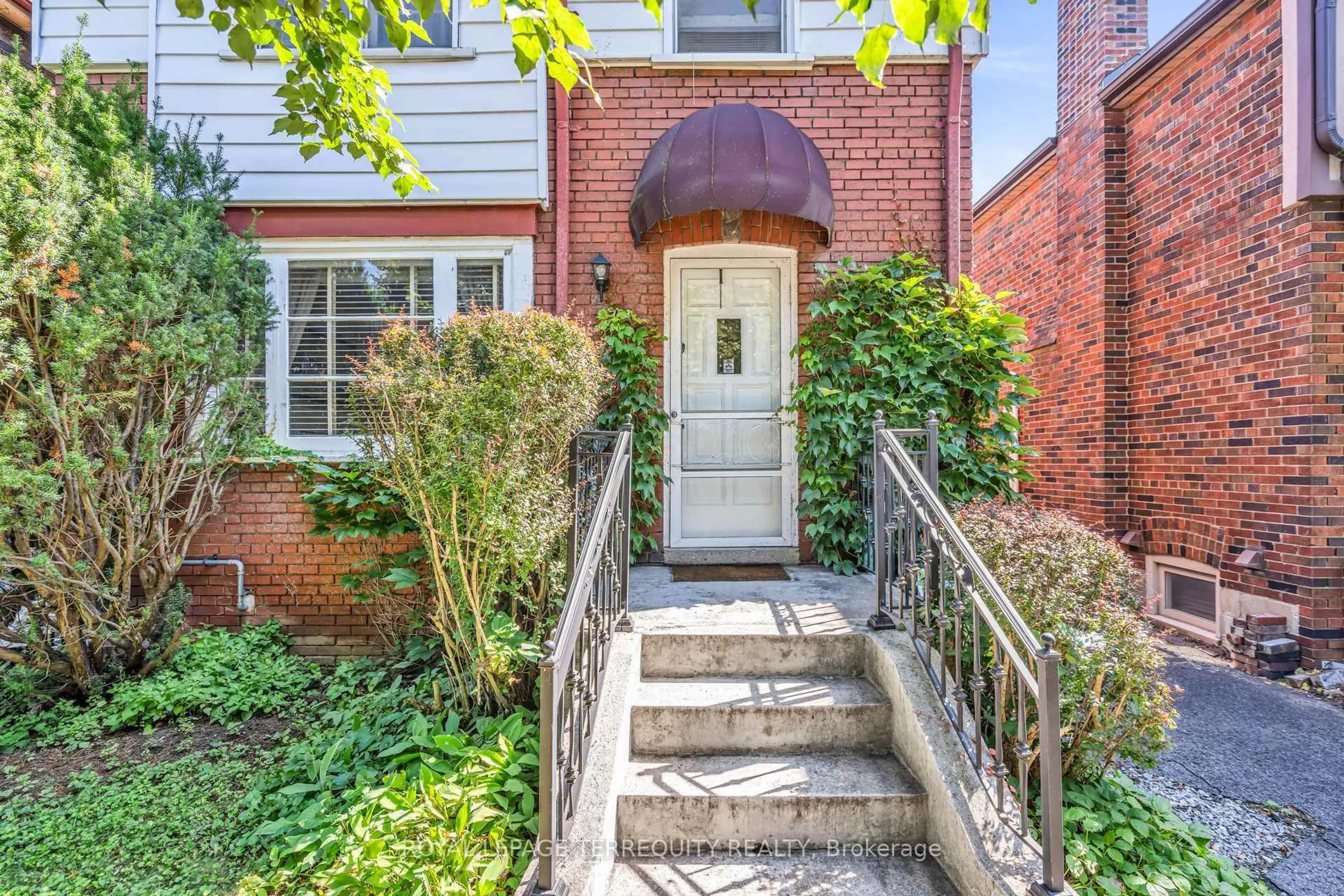 Home with brick exterior material, street for 391 Sutherland Dr, Toronto Ontario M4G 1K1