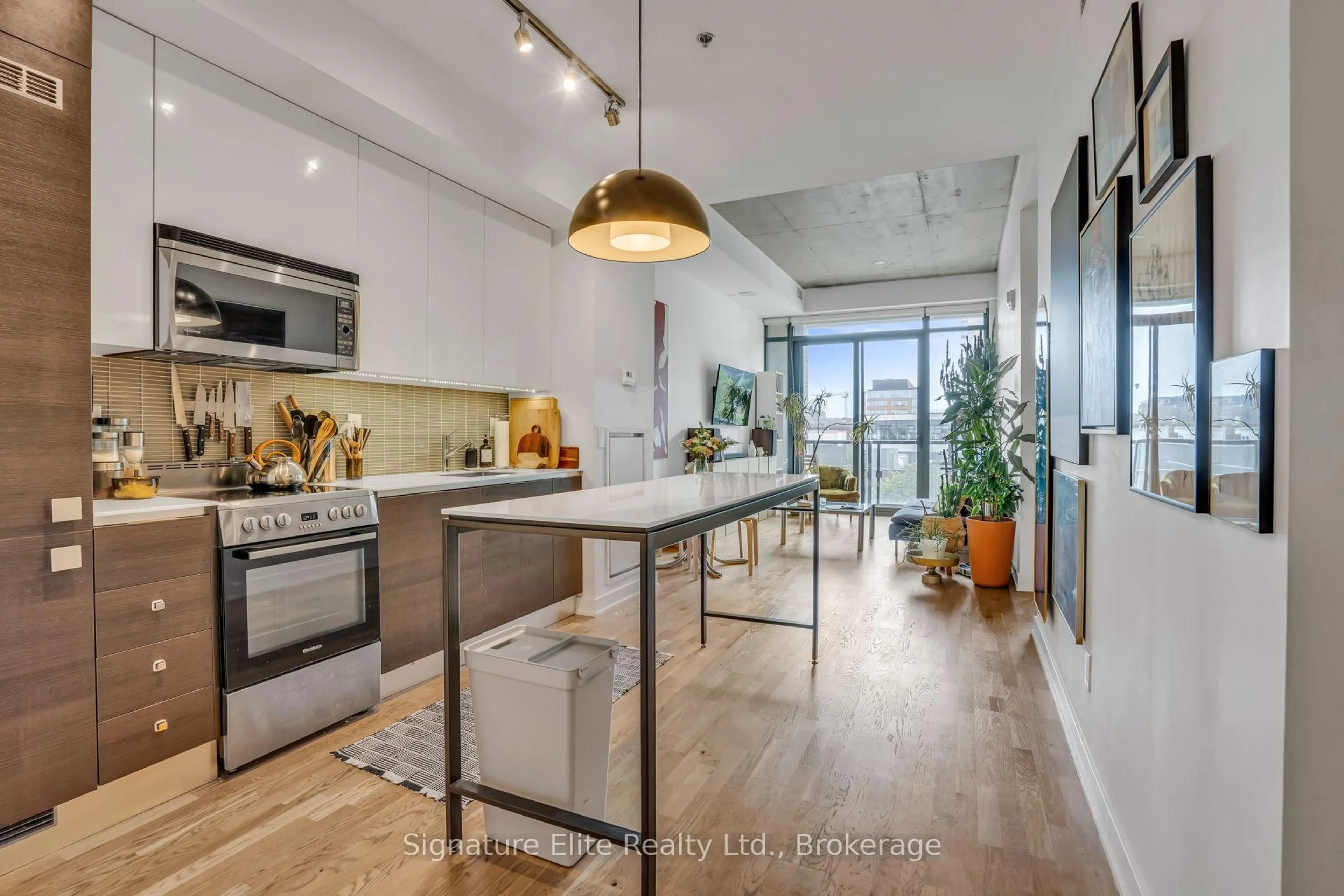 Open concept kitchen, unknown for 8 Dovercourt Rd #402, Toronto Ontario M6J 0B6