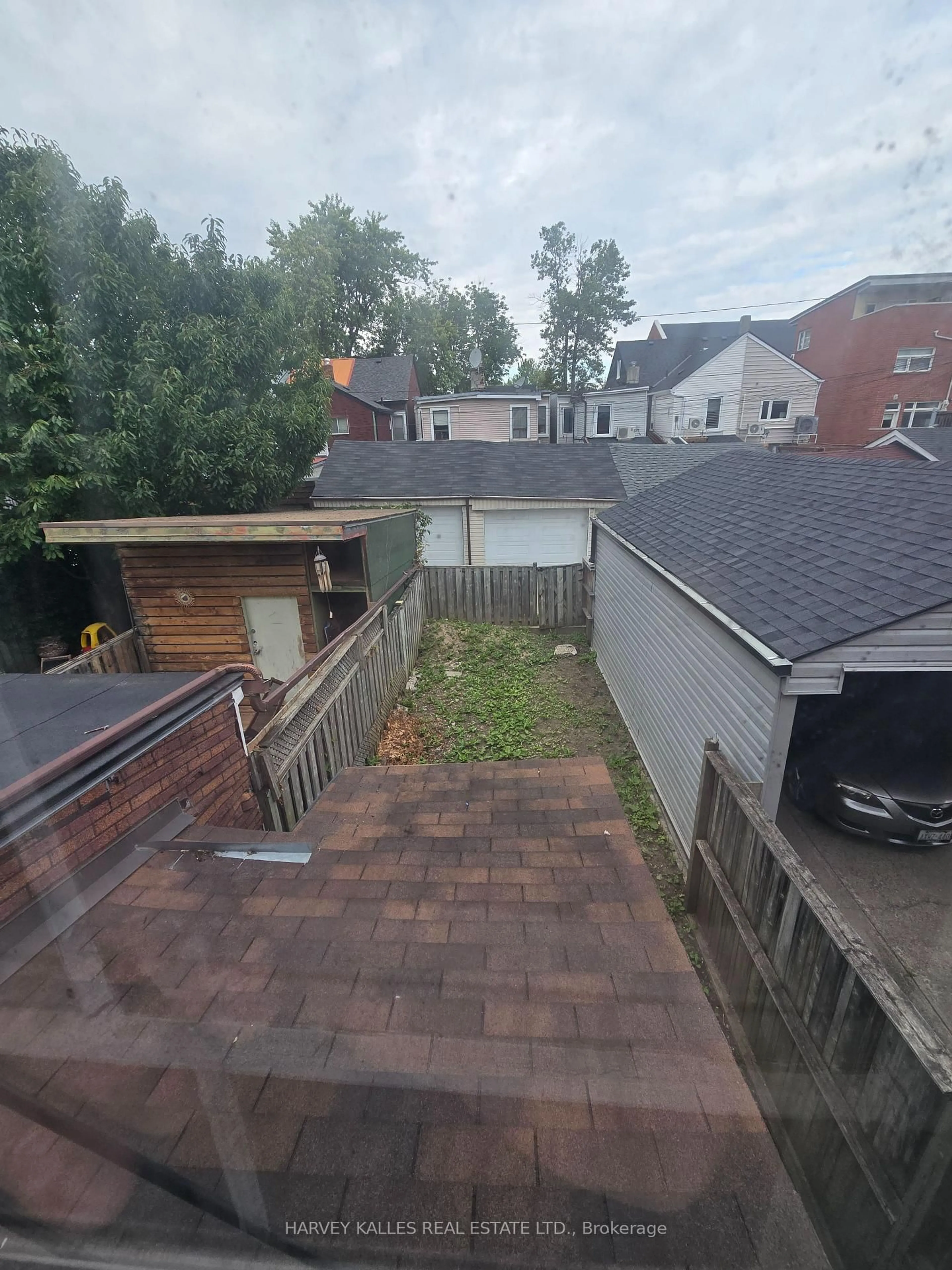 A pic from outside/outdoor area/front of a property/back of a property/a pic from drone, city buildings view from balcony for 12 Whitaker Ave, Toronto Ontario M6J 1A1
