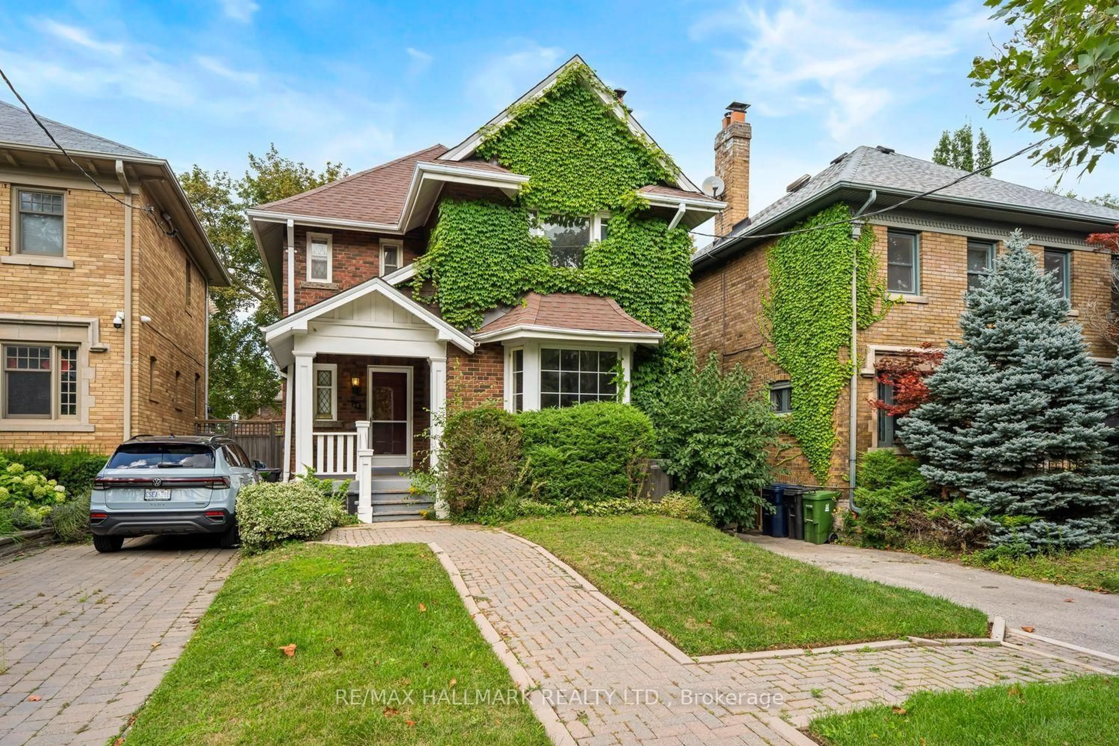 Home with brick exterior material, street for 48 Chatsworth Dr, Toronto Ontario M4R 1R5