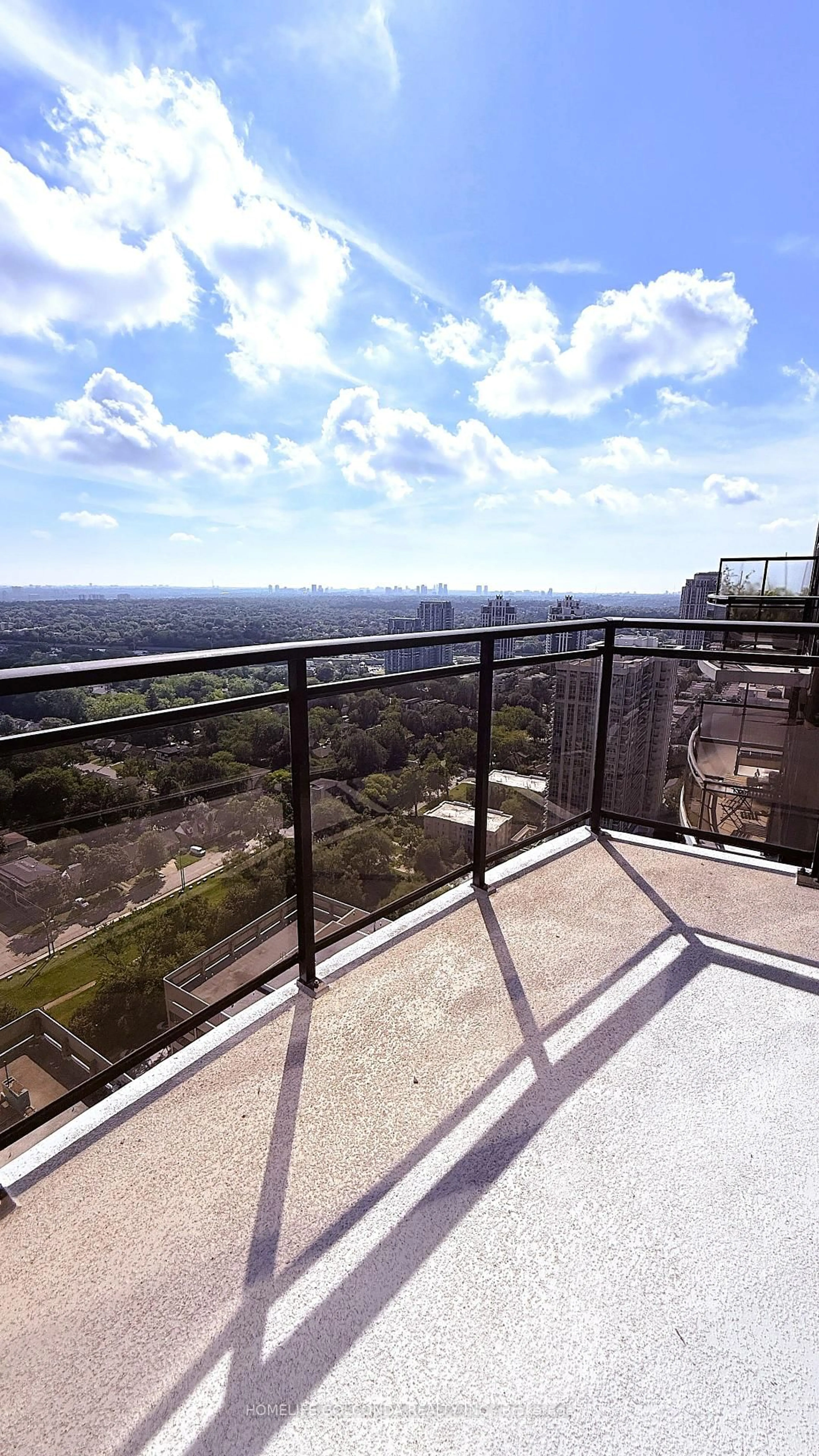 Balcony in the apartment, city buildings view from balcony for 33 Sheppard Ave #3412, Toronto Ontario M2N 7K1