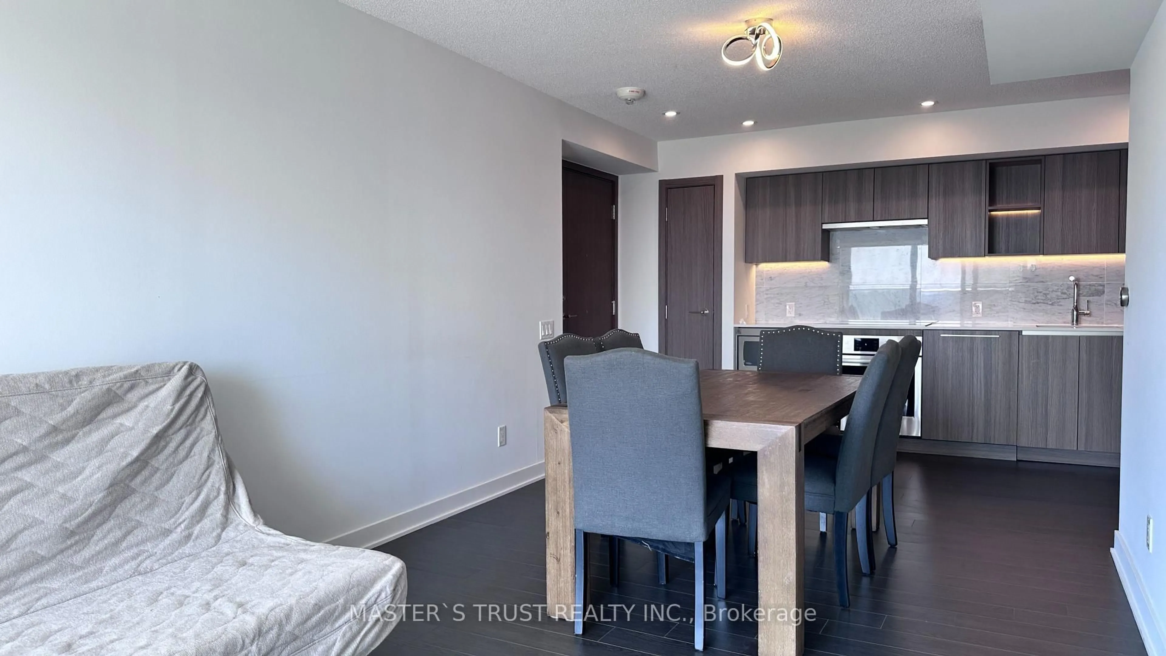 Open concept kitchen, wood/laminate floor for 17 Bathurst St #1715, Toronto Ontario M5V 0N1