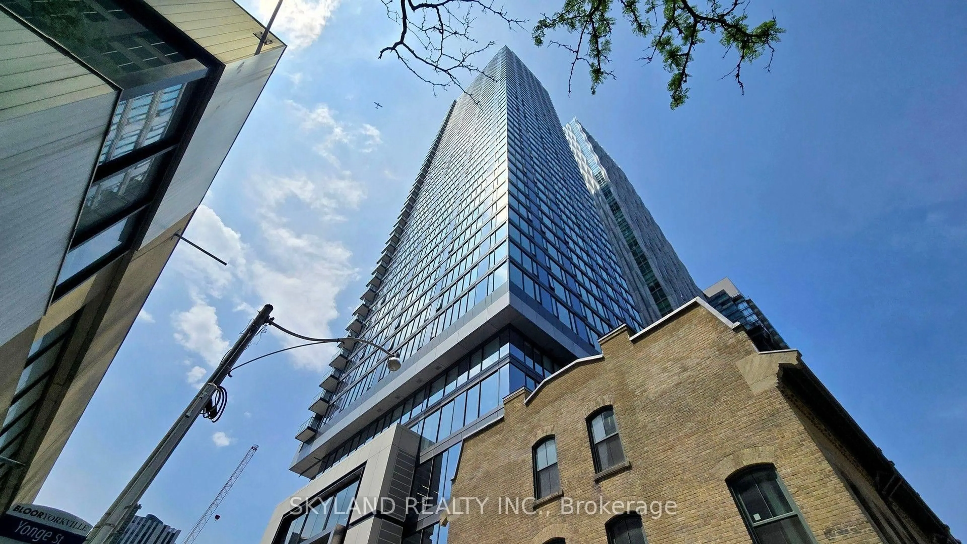 A pic from outside/outdoor area/front of a property/back of a property/a pic from drone, building for 8 Cumberland St #4305, Toronto Ontario M4W 0B6