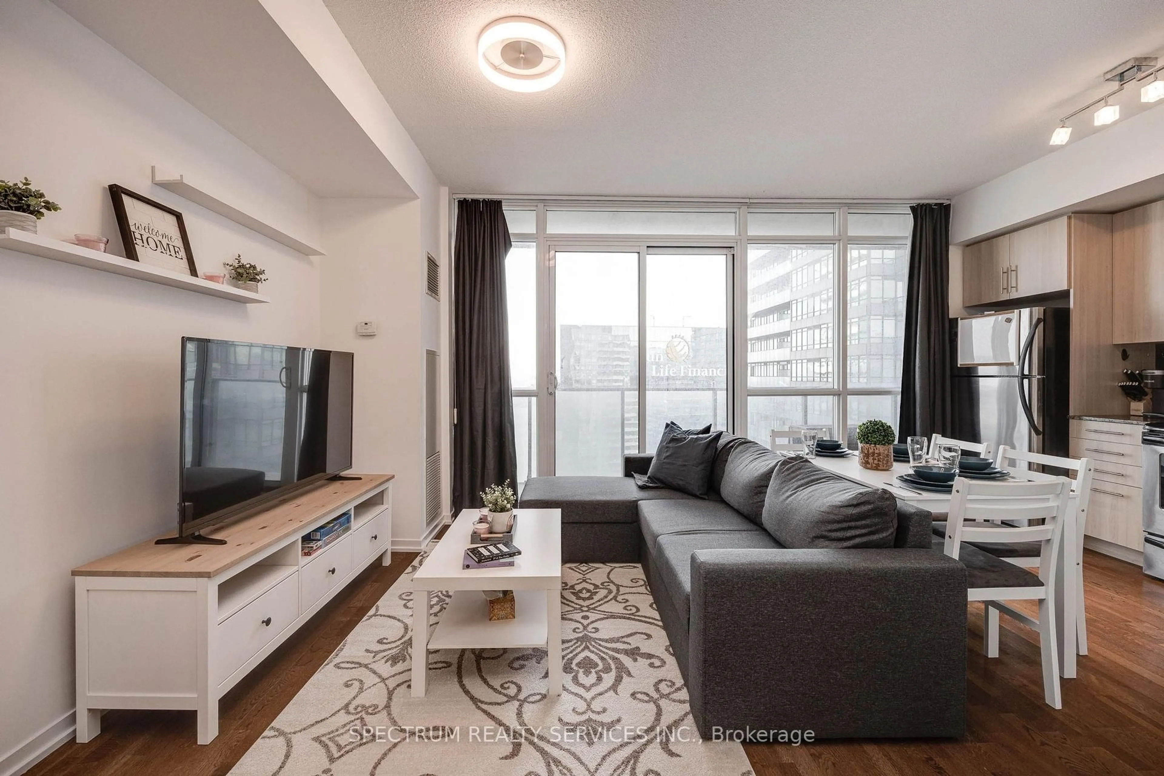 Living room with furniture, unknown for 65 Bremner Blvd #4511, Toronto Ontario M5J 0A6