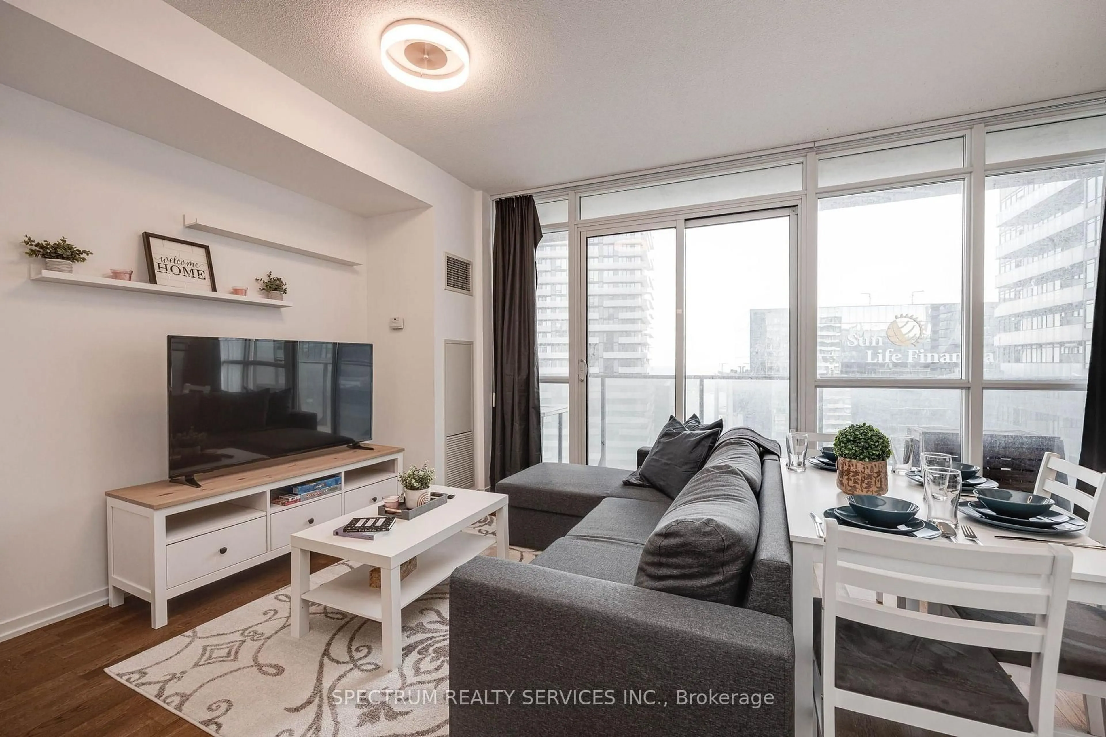Living room with furniture, unknown for 65 Bremner Blvd #4511, Toronto Ontario M5J 0A6