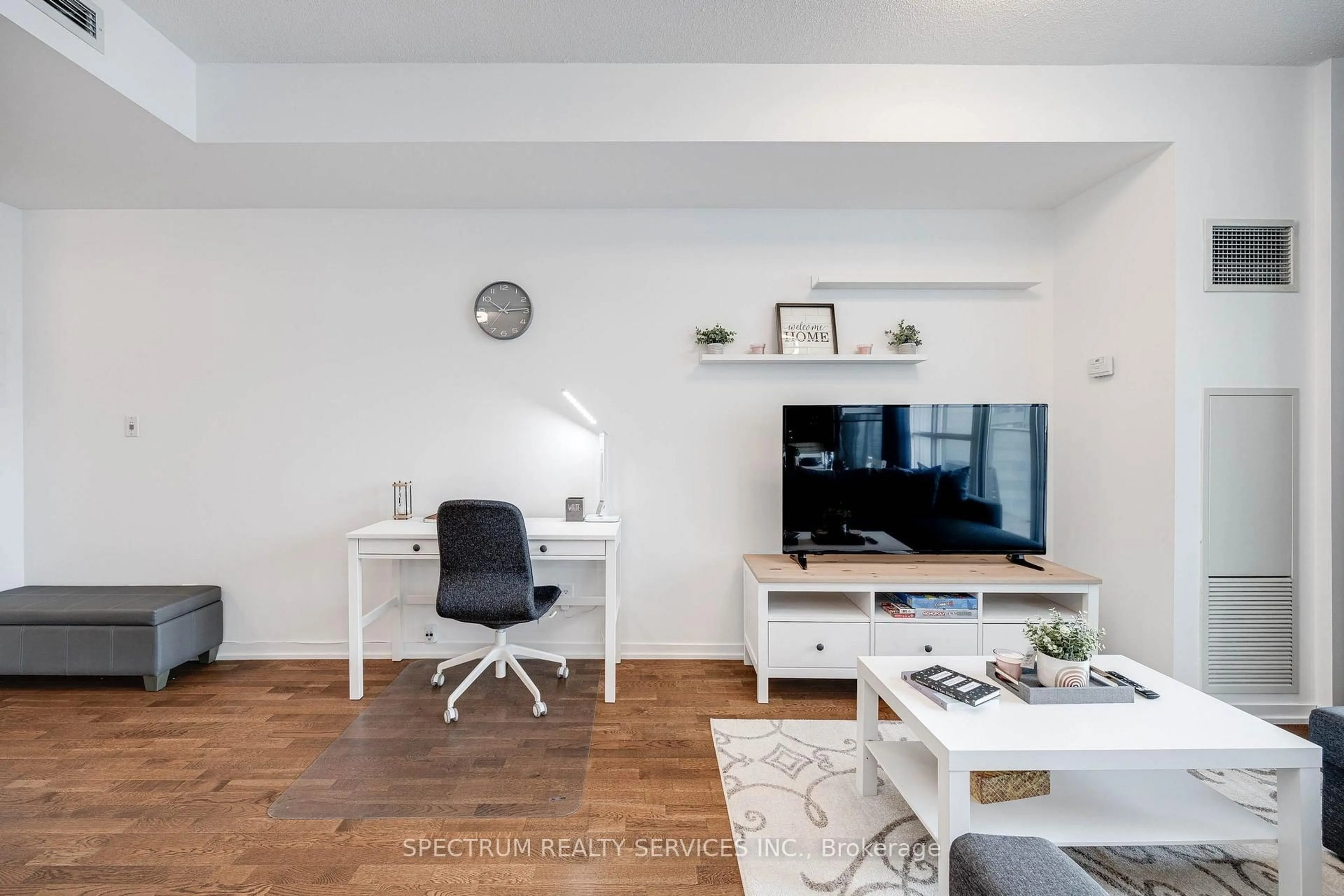 Living room with furniture, wood/laminate floor for 65 Bremner Blvd #4511, Toronto Ontario M5J 0A6