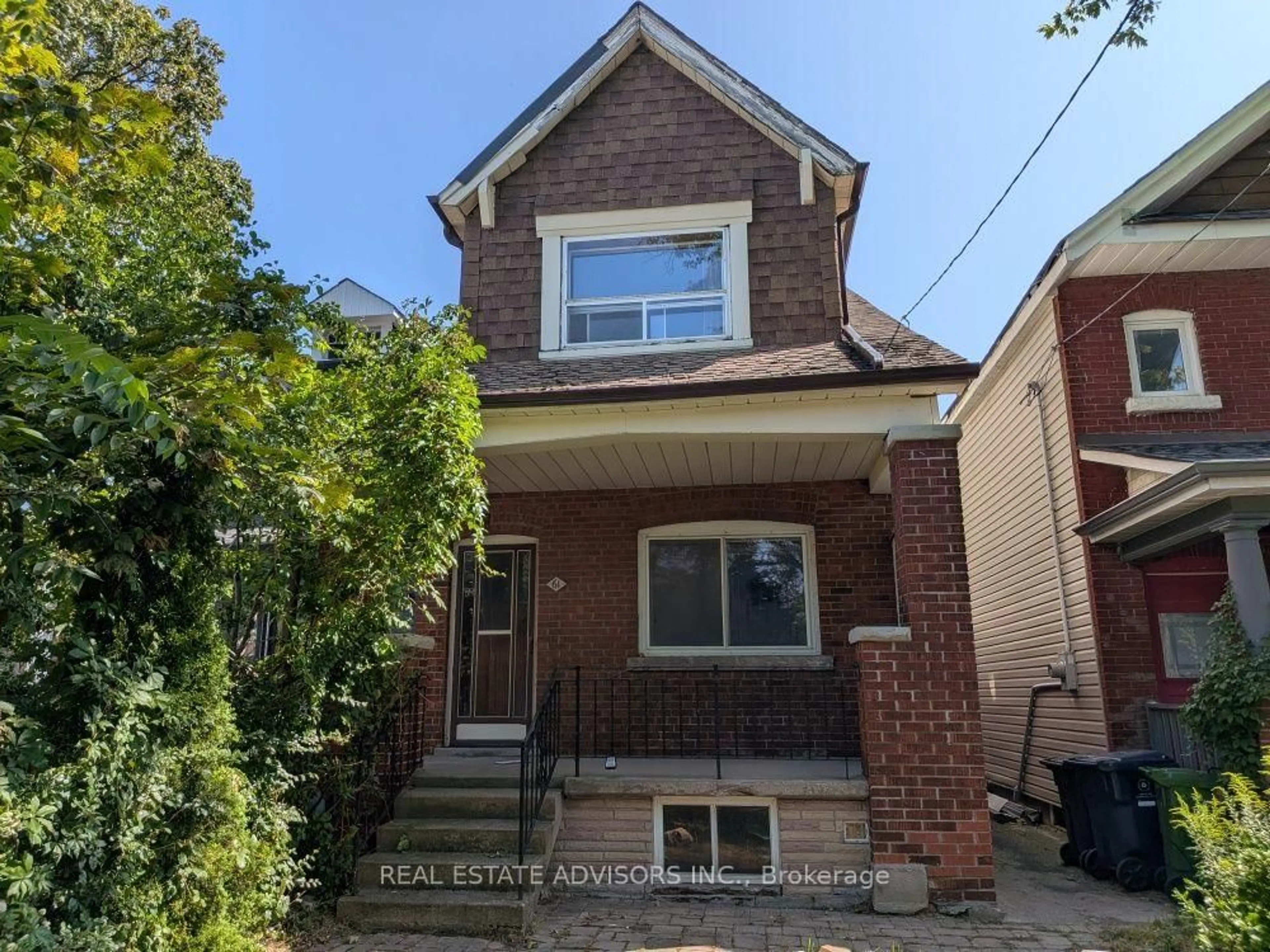 Home with brick exterior material, street for 61 Greensides Ave, Toronto Ontario M6G 3P5