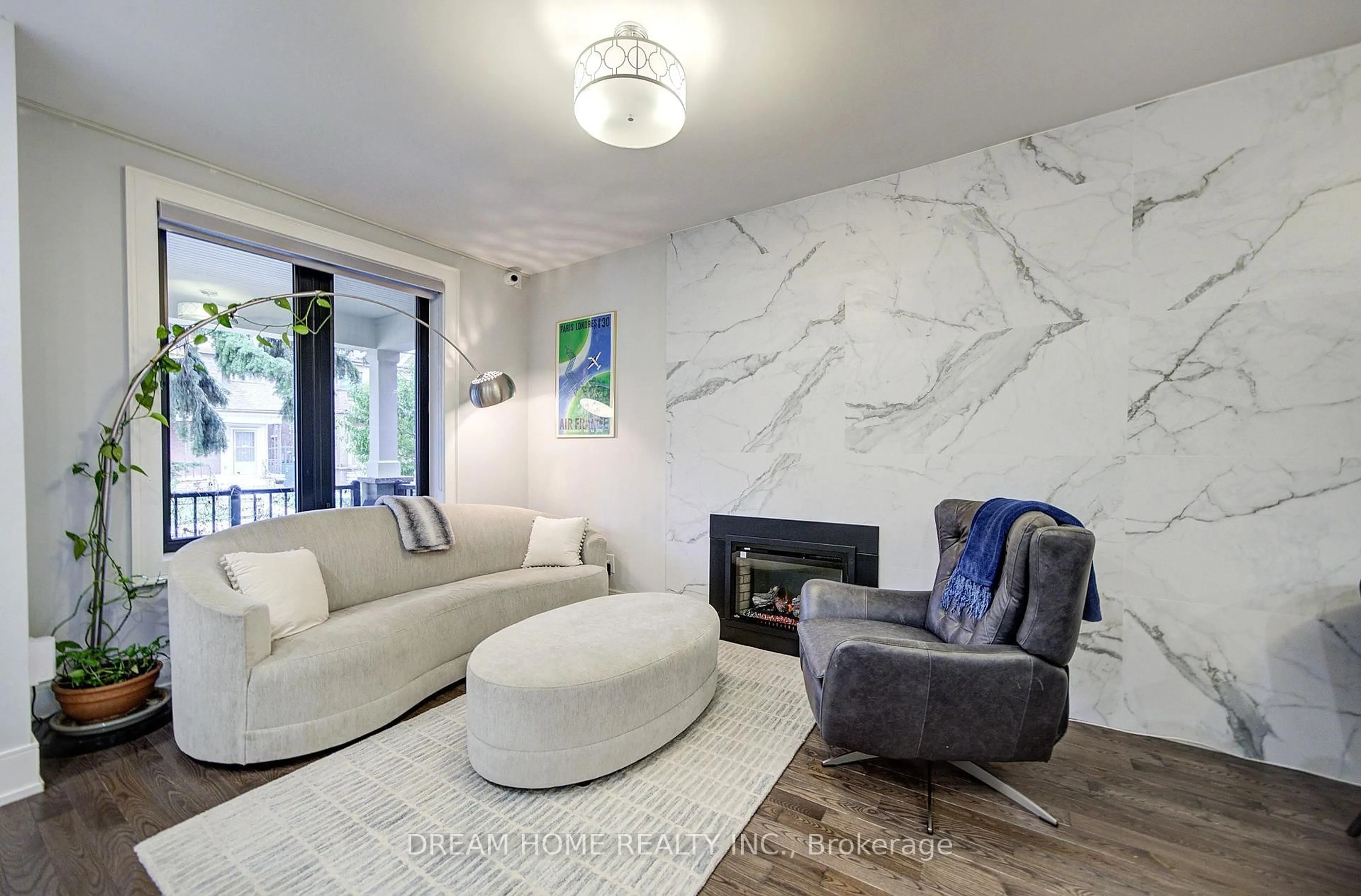 Living room with furniture, ceramic/tile floor for 737 Shaw St, Toronto Ontario M6G 3L8