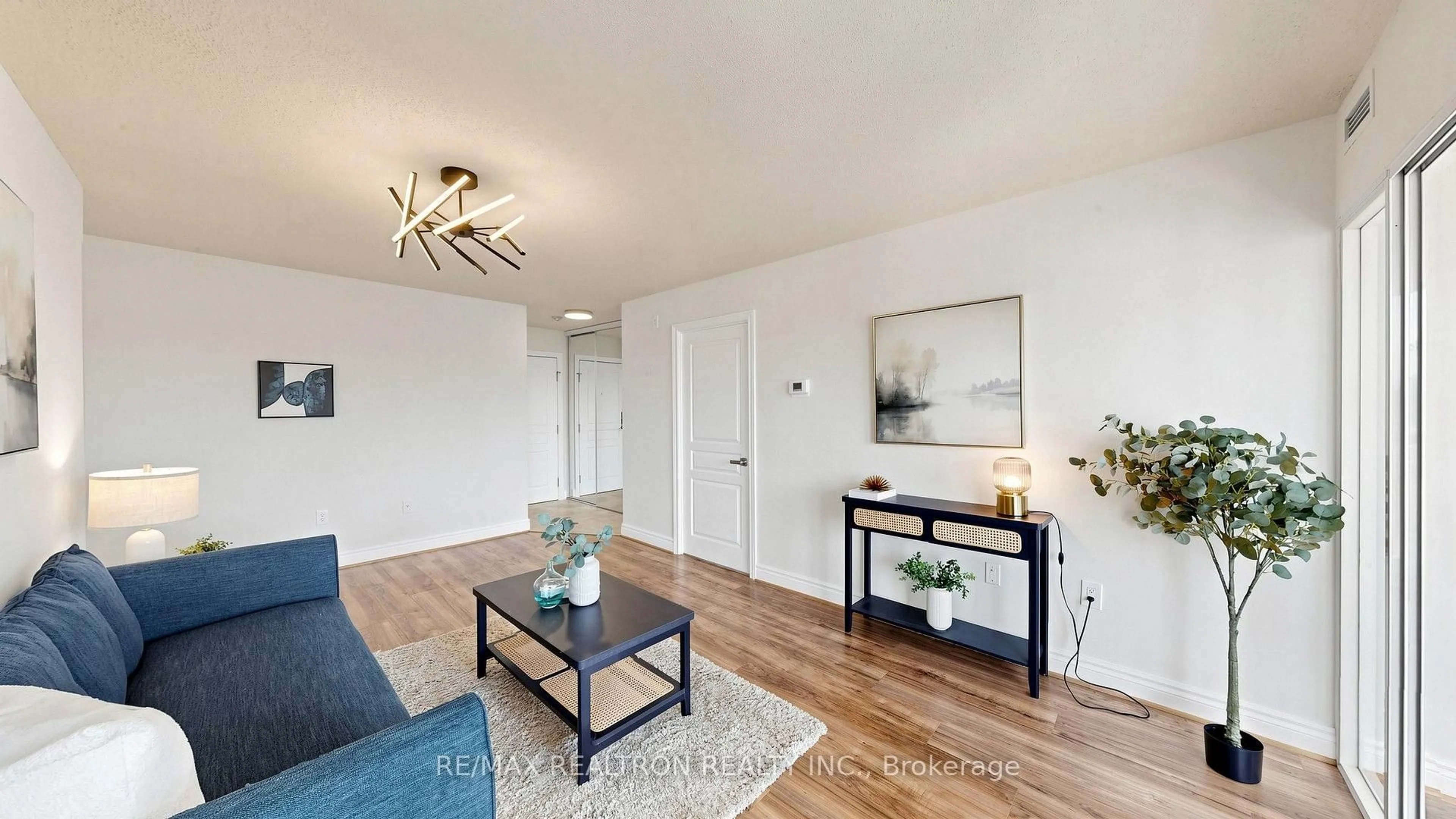 Living room with furniture, wood/laminate floor for 1 Hycrest Ave #608, Toronto Ontario M2N 6V8