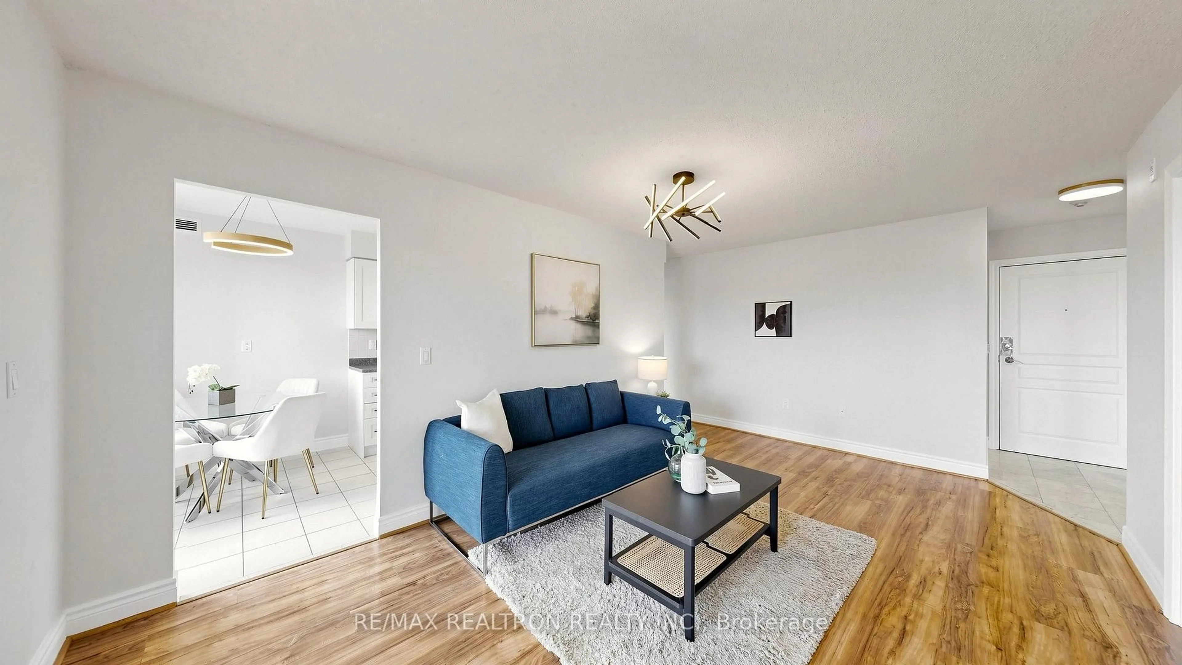 Living room with furniture, wood/laminate floor for 1 Hycrest Ave #608, Toronto Ontario M2N 6V8