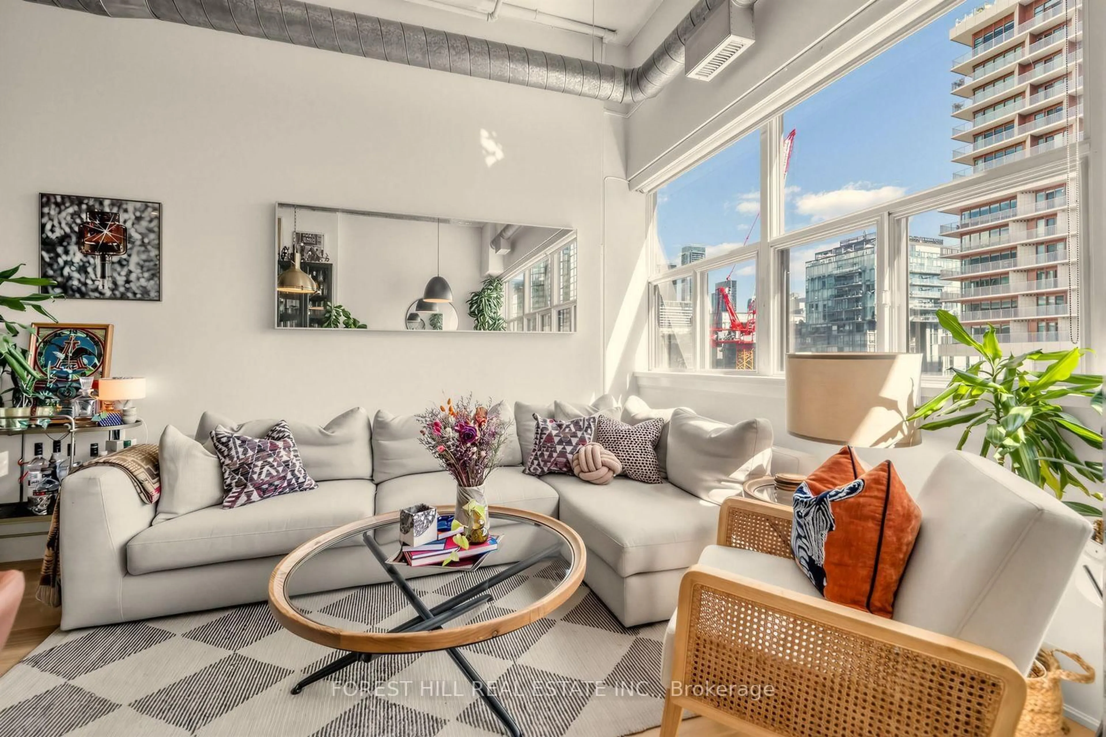 Living room with furniture, cement floor for 700 King St #518, Toronto Ontario M5V 2Y6
