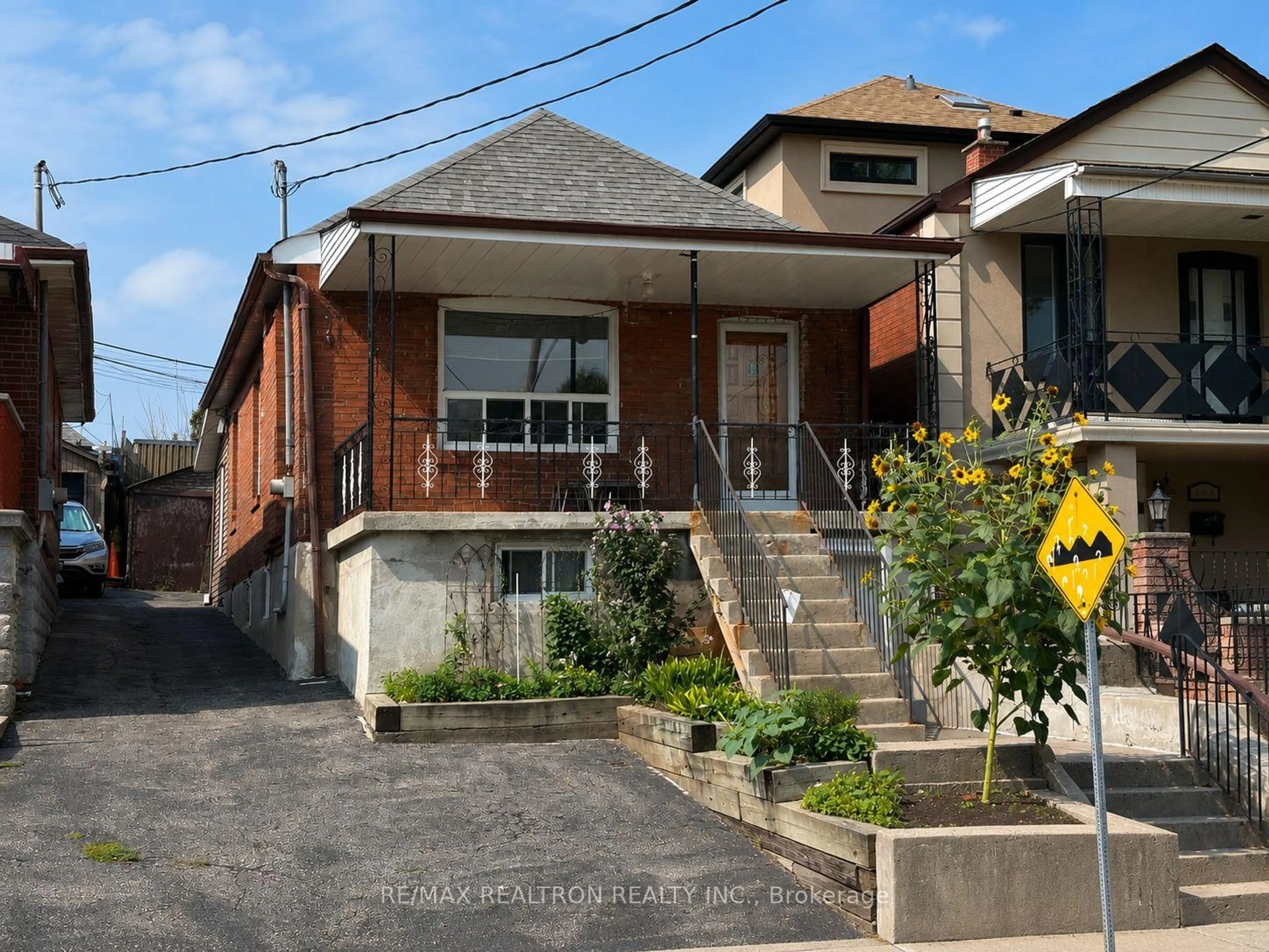 Home with brick exterior material, street for 442 Northcliffe Blvd, Toronto Ontario M6E 3L2