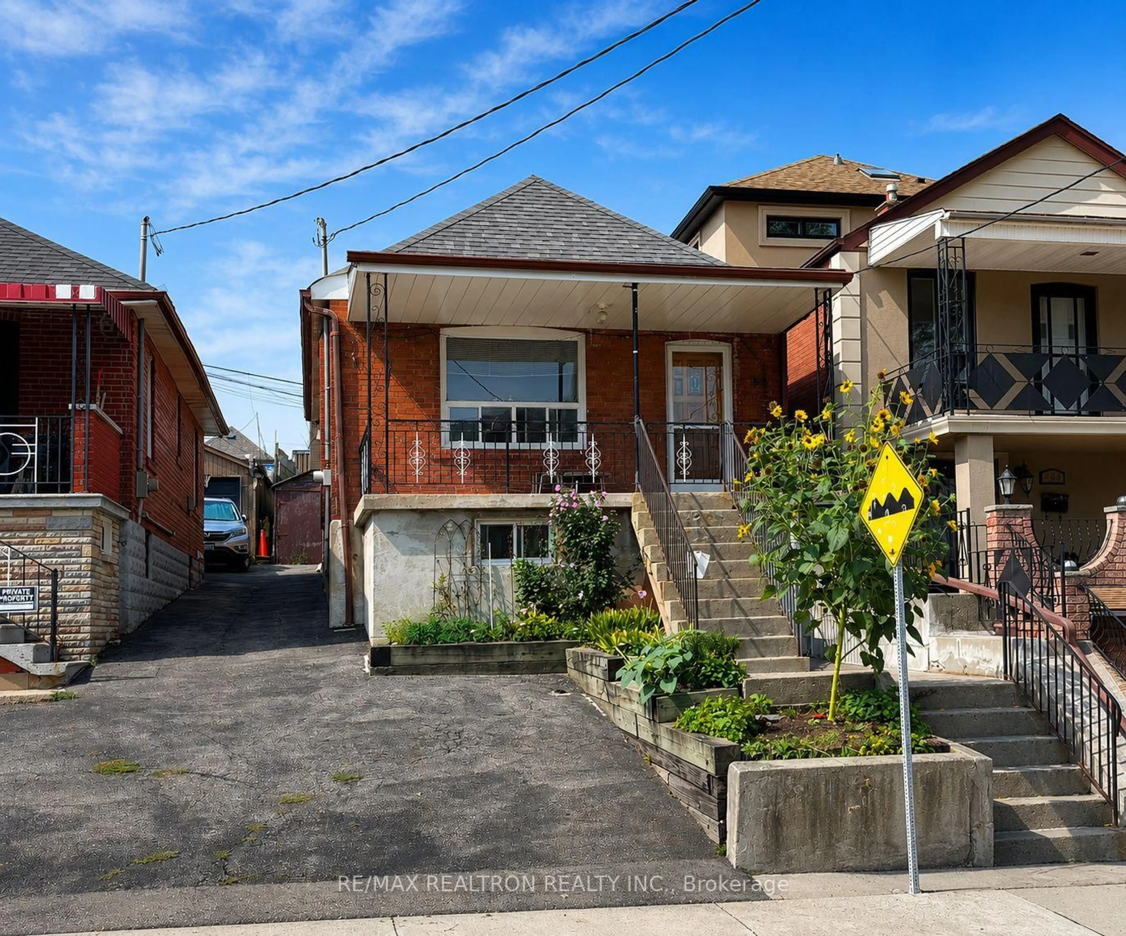 Home with brick exterior material, street for 442 Northcliffe Blvd, Toronto Ontario M6E 3L2