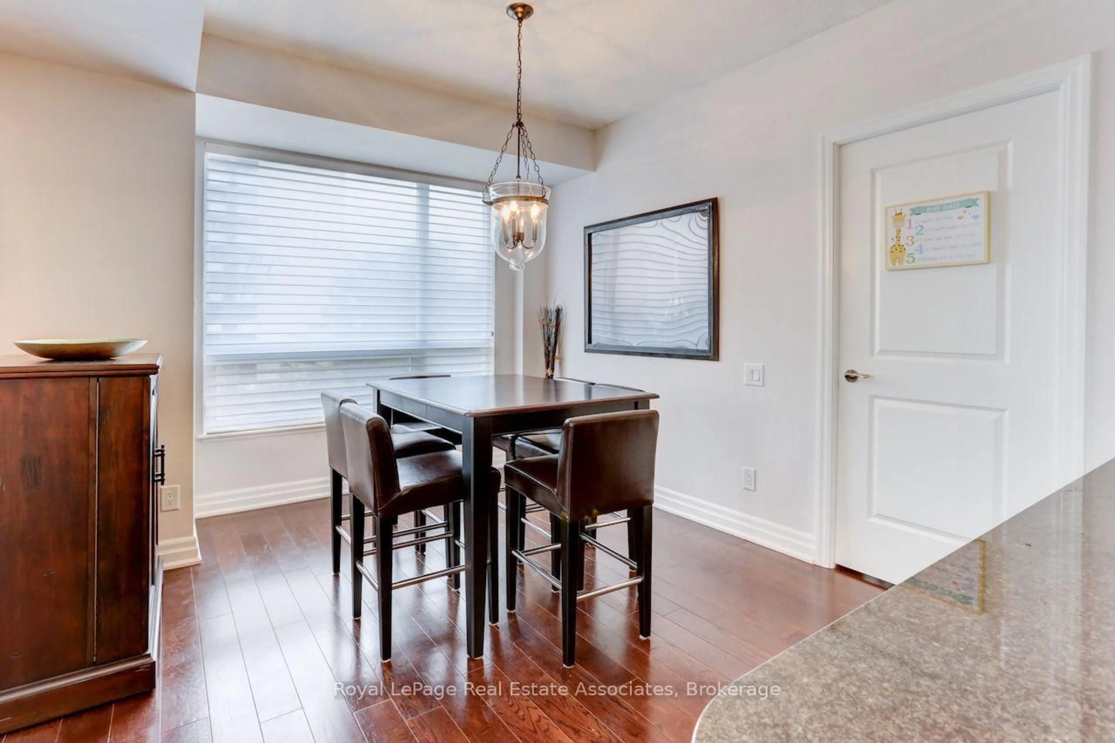Dining room, wood/laminate floor for 17 Ruddington Dr #402, Toronto Ontario M2K 0A8