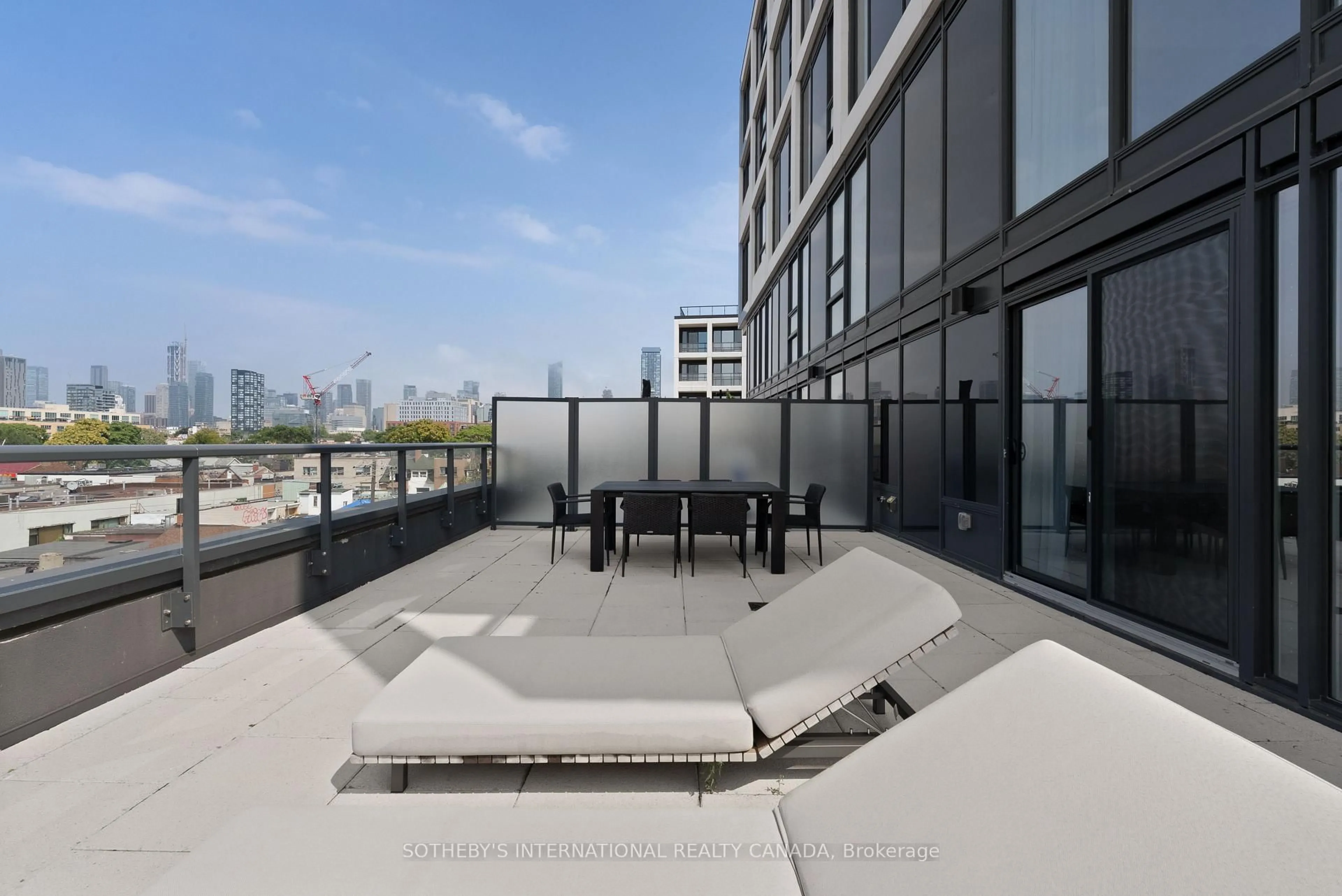 Patio, city buildings view from balcony for 115 Denison Ave #512, Toronto Ontario M5T 0E6