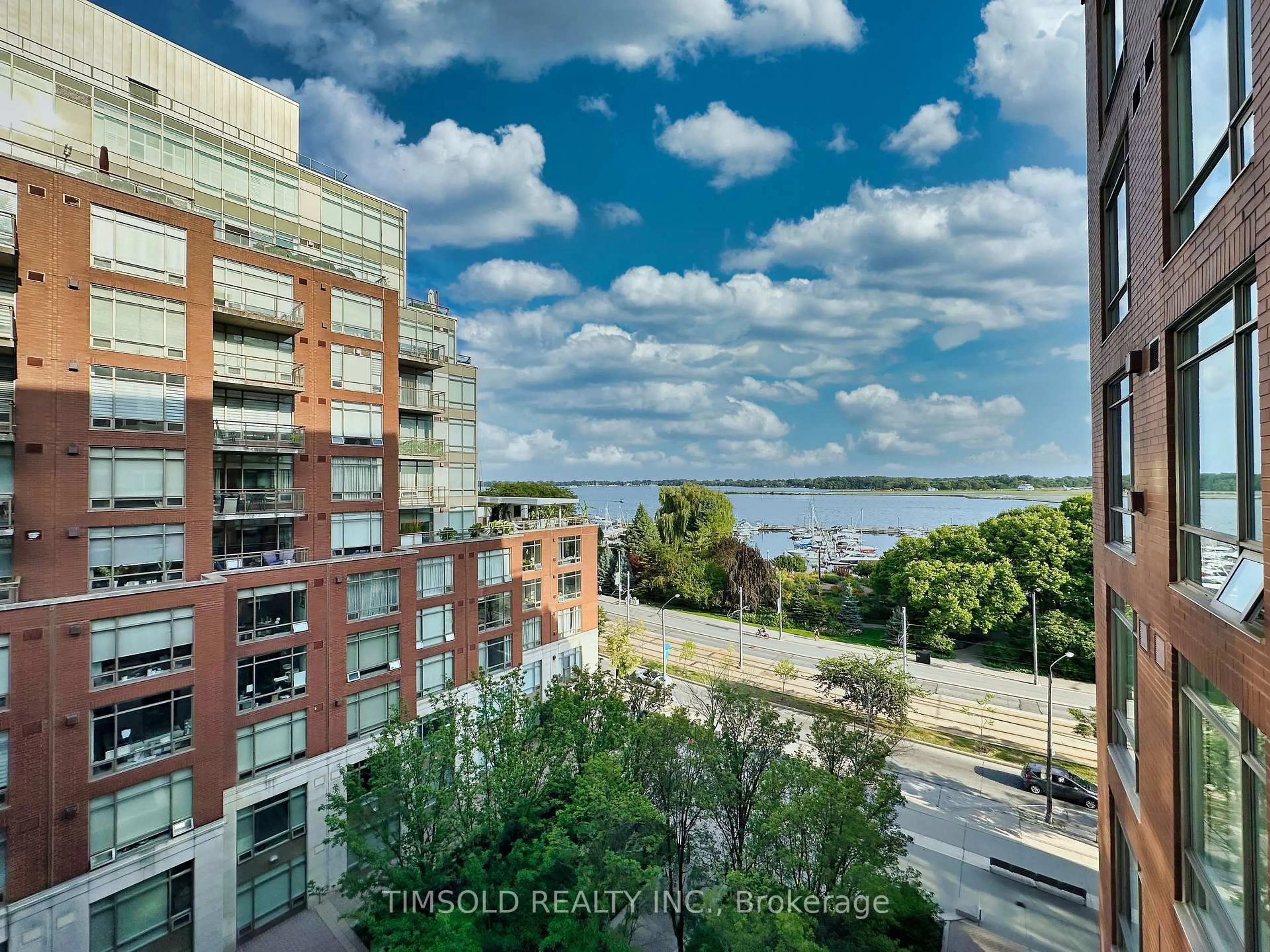 A pic from outside/outdoor area/front of a property/back of a property/a pic from drone, water/lake/river/ocean view for 500 Queens Quay #708W, Toronto Ontario M5V 3K8