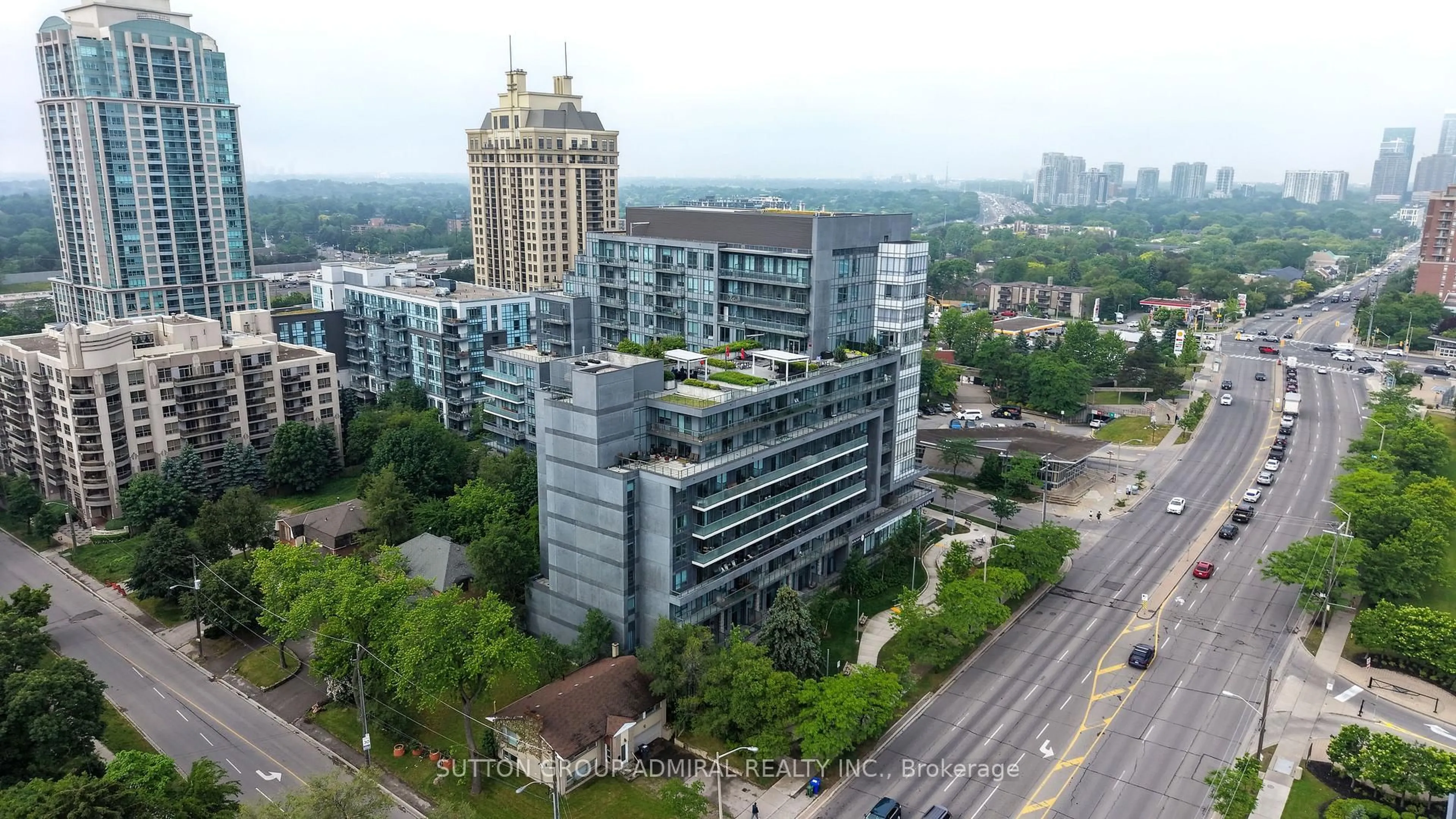 A pic from outside/outdoor area/front of a property/back of a property/a pic from drone, city buildings view from balcony for 7 Kenaston Gdns #124, Toronto Ontario M2K 0E9