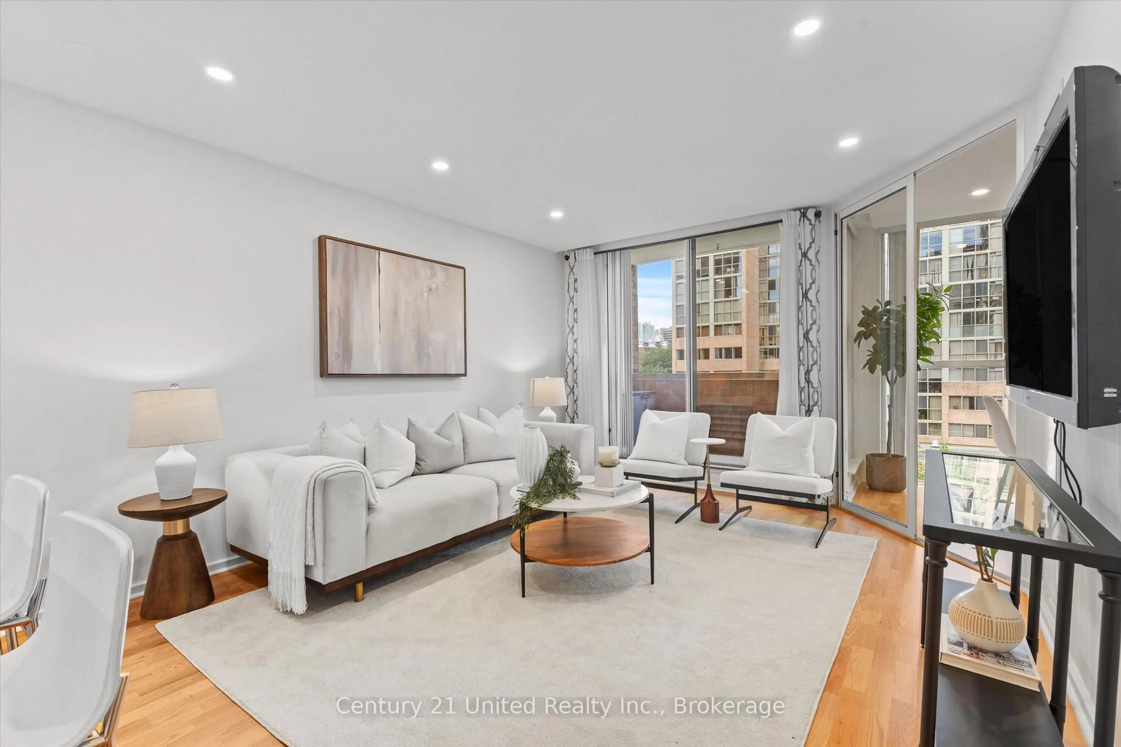 Living room with furniture, unknown for 60 Homewood Ave #504, Toronto Ontario M4Y 2X4