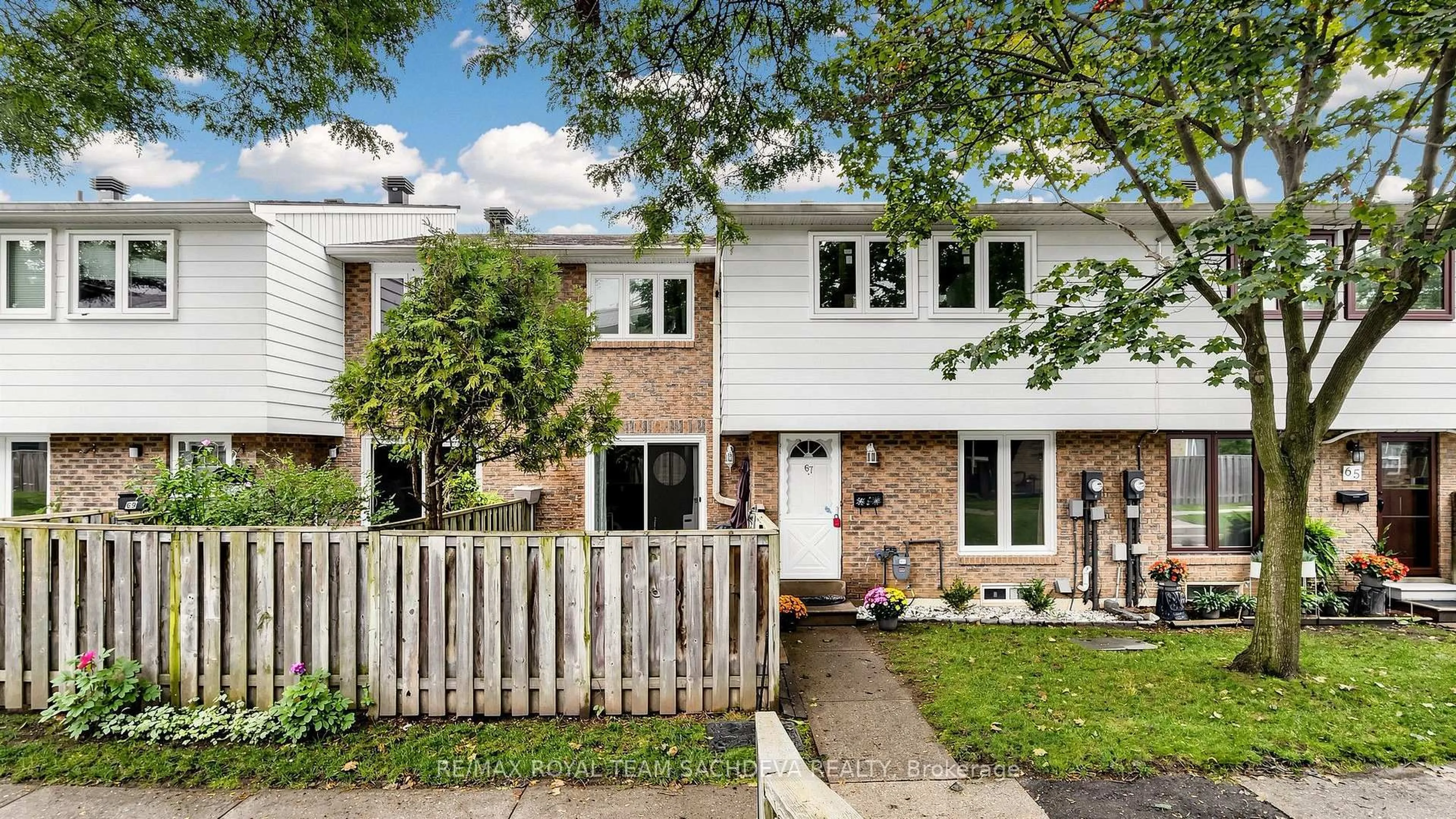 Home with brick exterior material, street for 67 Rock Fernway, Toronto Ontario M2J 4N3
