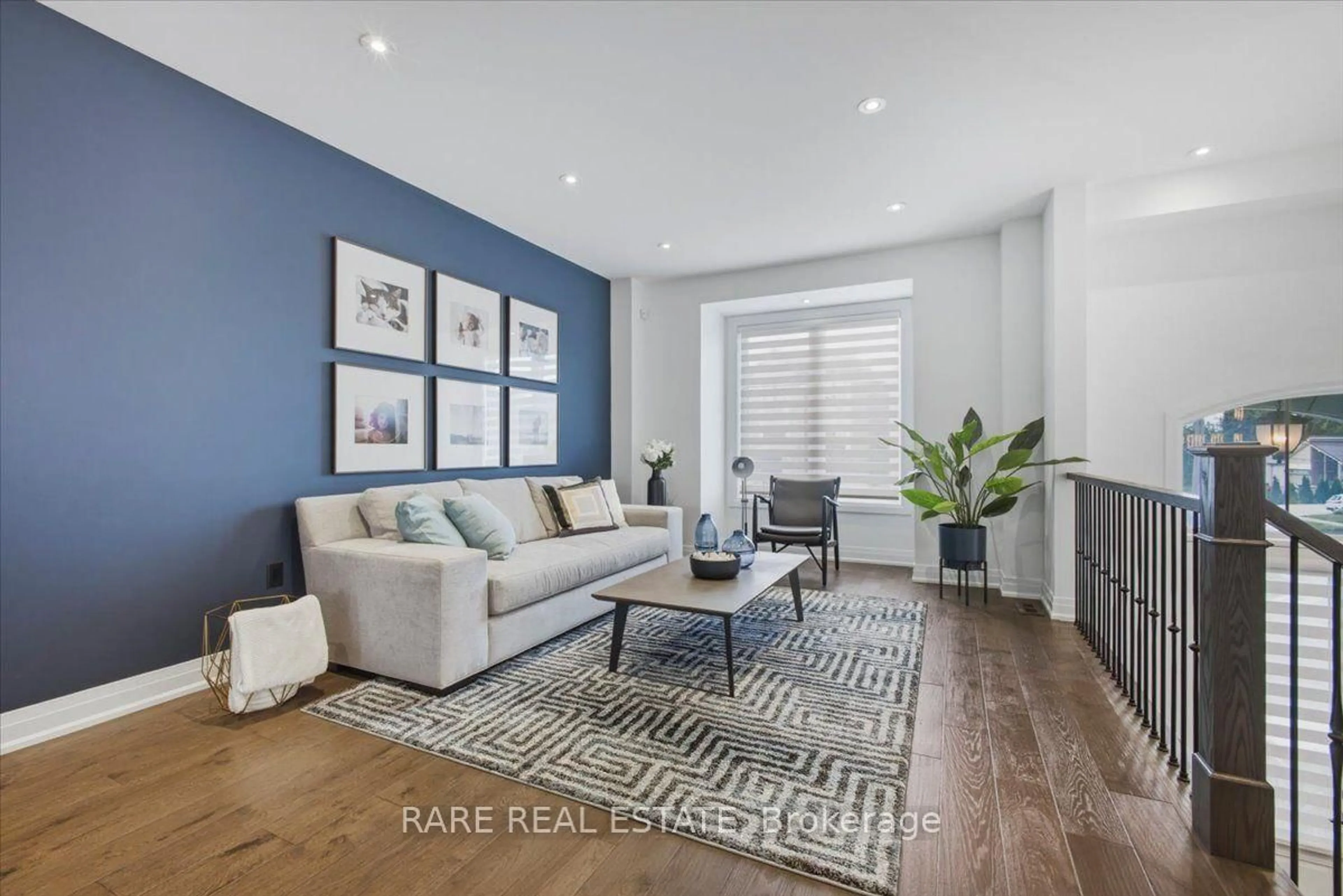 Living room with furniture, wood/laminate floor for 89 William Durie Way, Toronto Ontario M2R 0A9