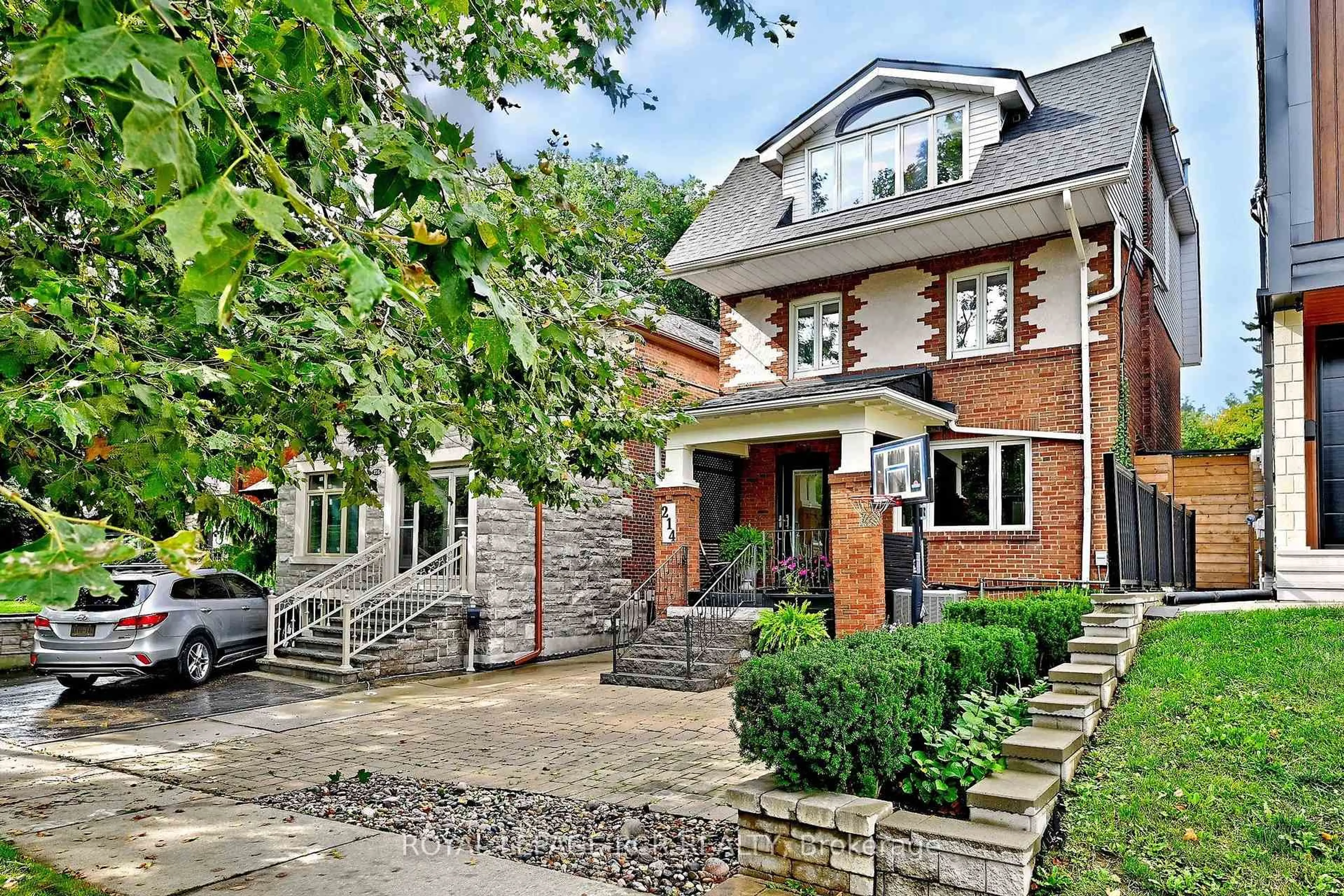 Home with brick exterior material, street for 214 Briar Hill Ave, Toronto Ontario M4R 1J2