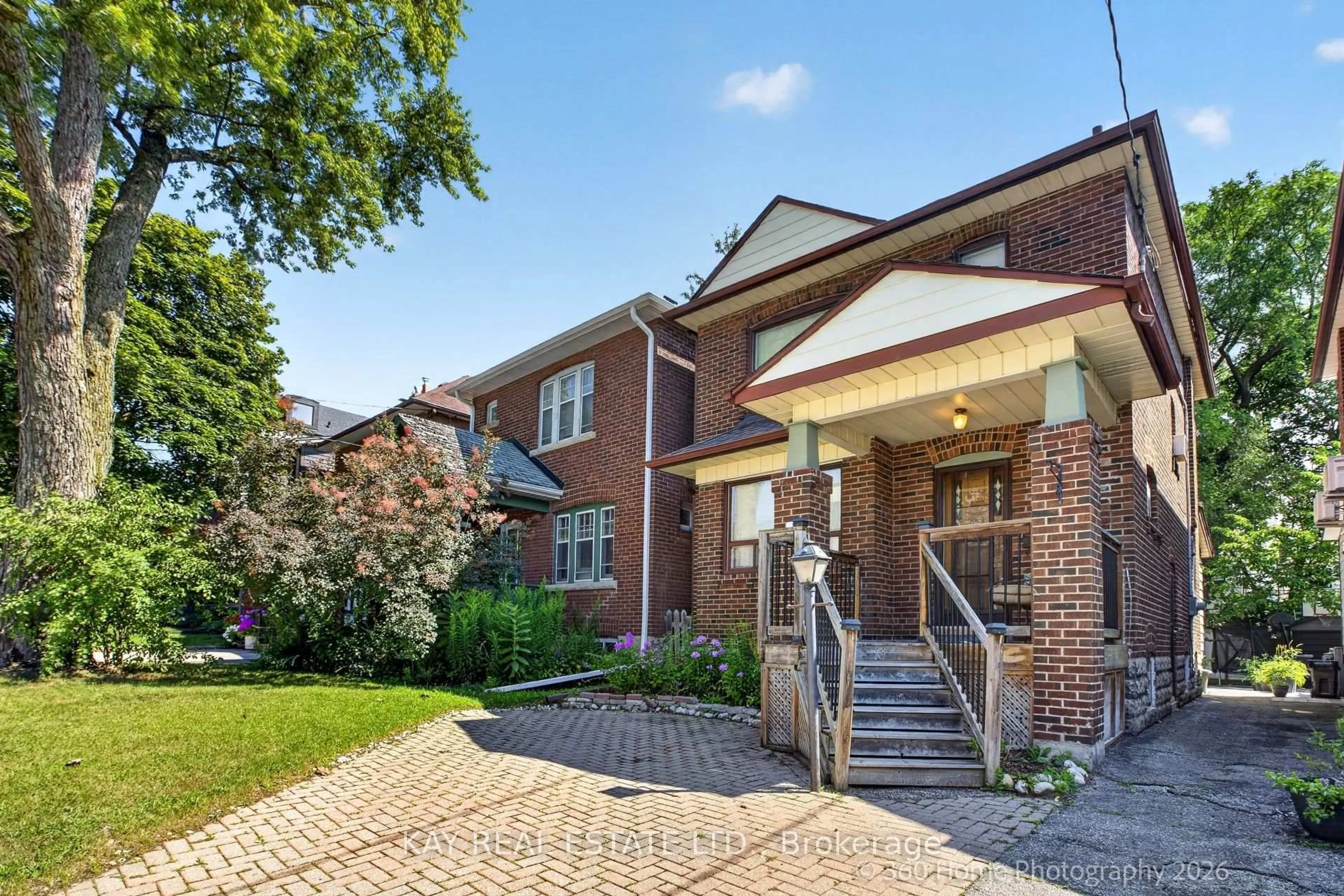Home with brick exterior material, street for 59 Cherrywood Ave, Toronto Ontario M6C 2X4