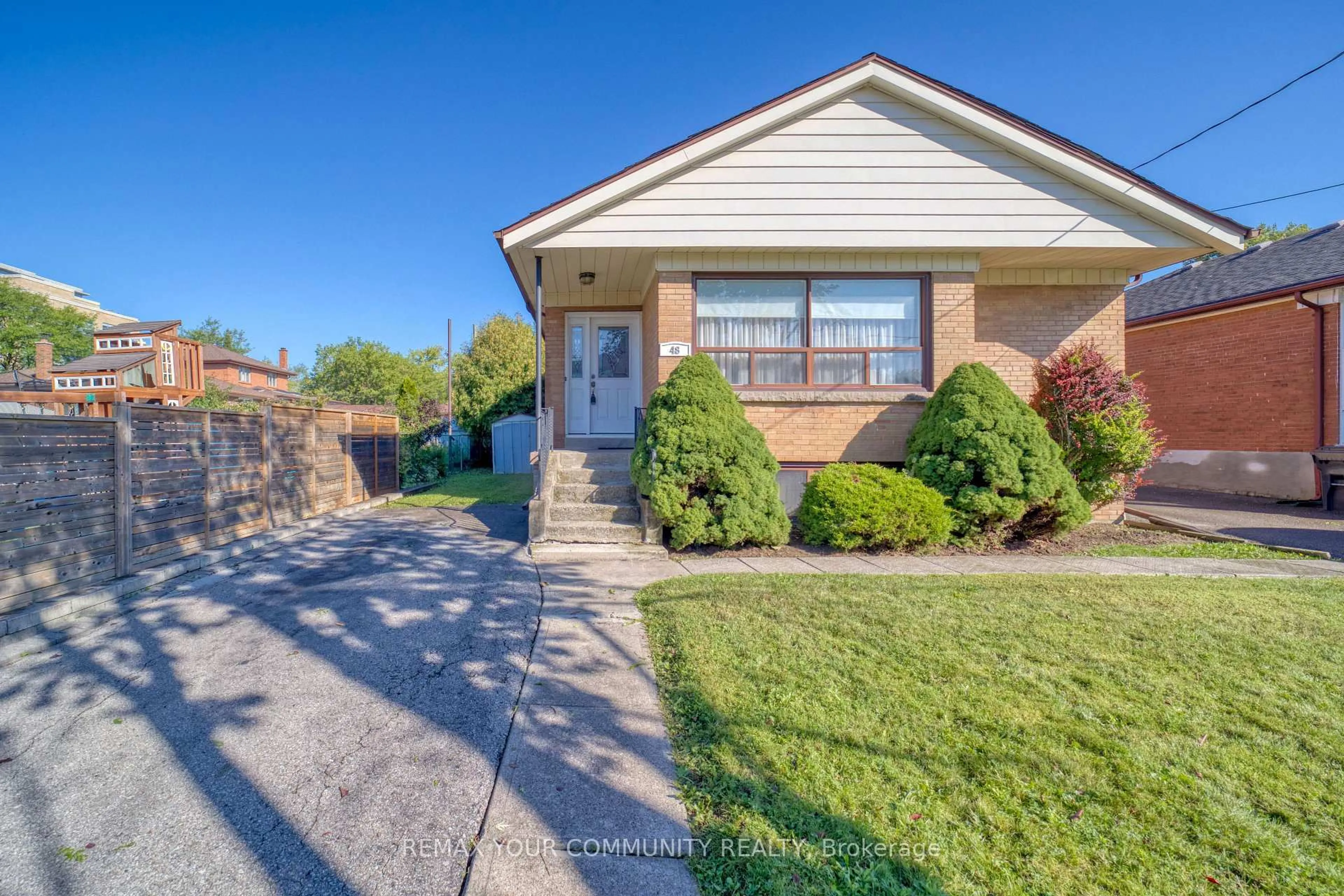 Home with brick exterior material, street for 48 Alexis Blvd, Toronto Ontario M3H 2P4