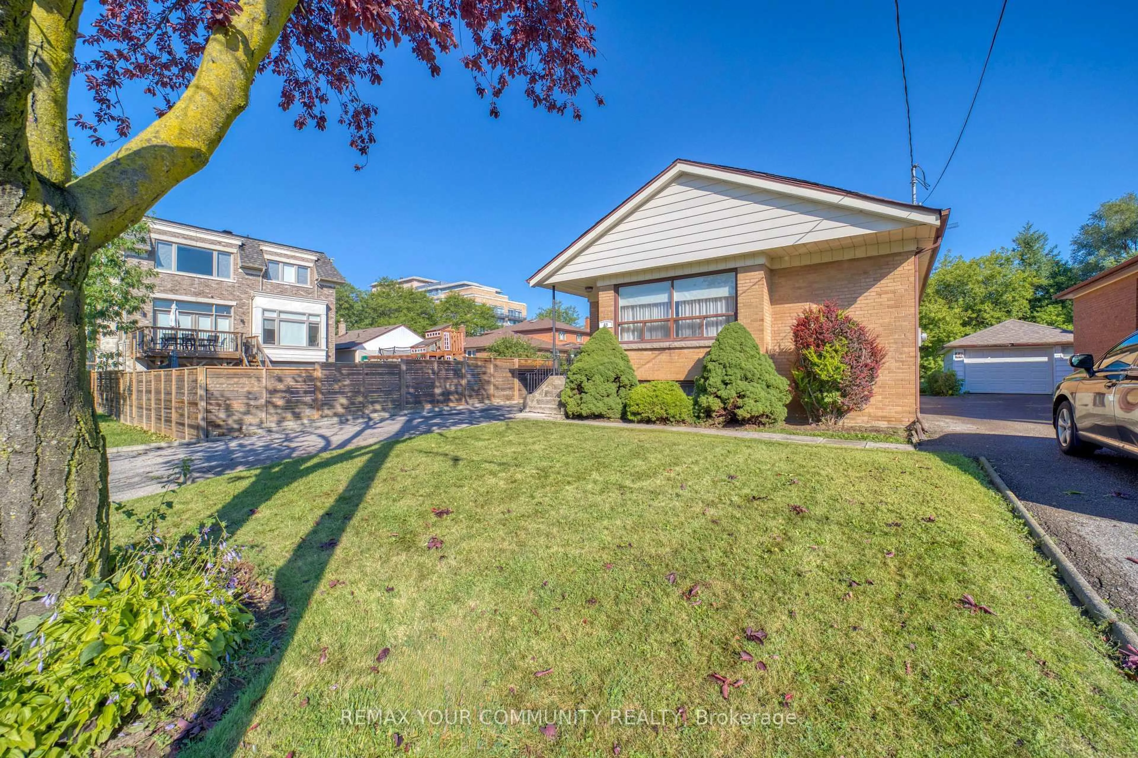 A pic from outside/outdoor area/front of a property/back of a property/a pic from drone, street for 48 Alexis Blvd, Toronto Ontario M3H 2P4