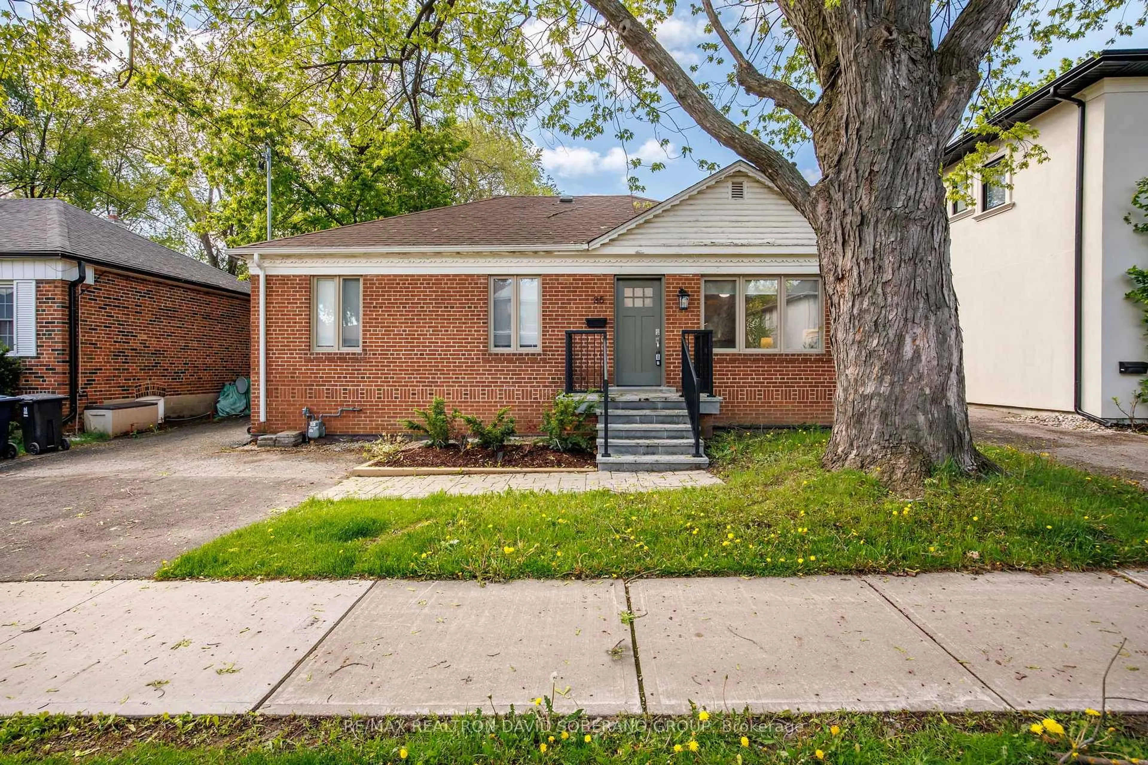Home with brick exterior material, street for 35 Almore Ave, Toronto Ontario M3H 2G9