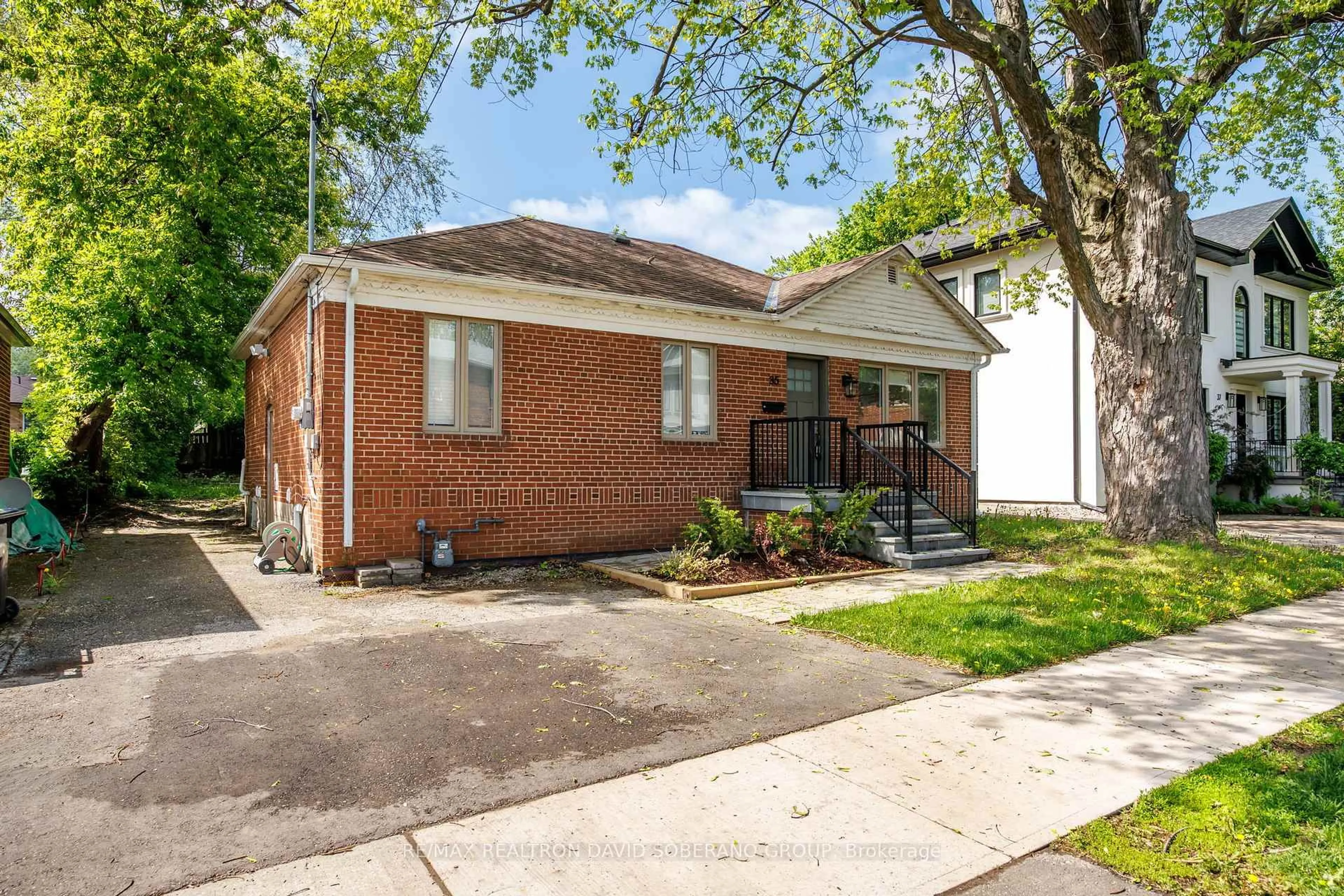 Home with brick exterior material, street for 35 Almore Ave, Toronto Ontario M3H 2G9