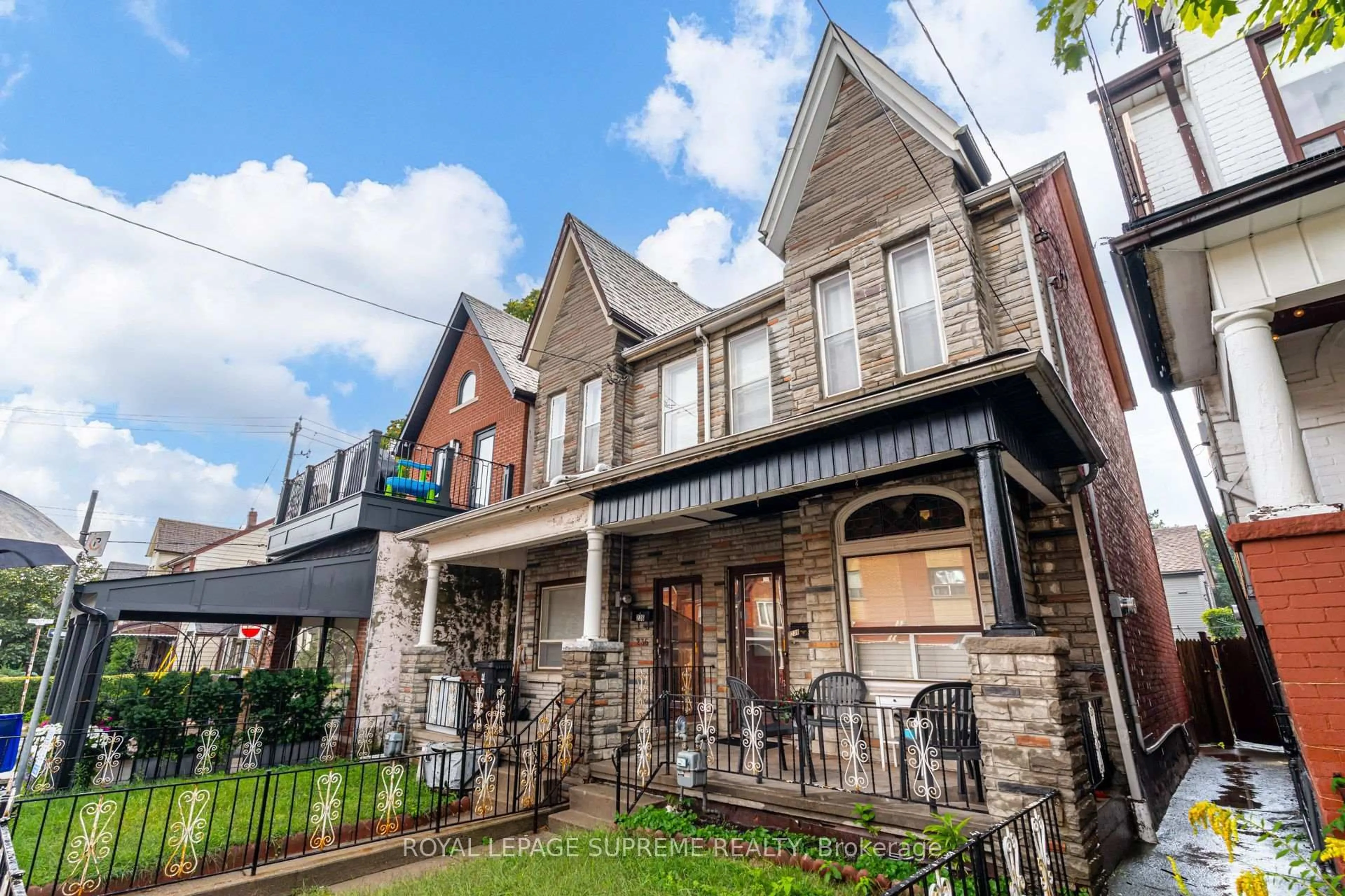 Home with brick exterior material, street for 238 Brock Ave, Toronto Ontario M6K 2M2