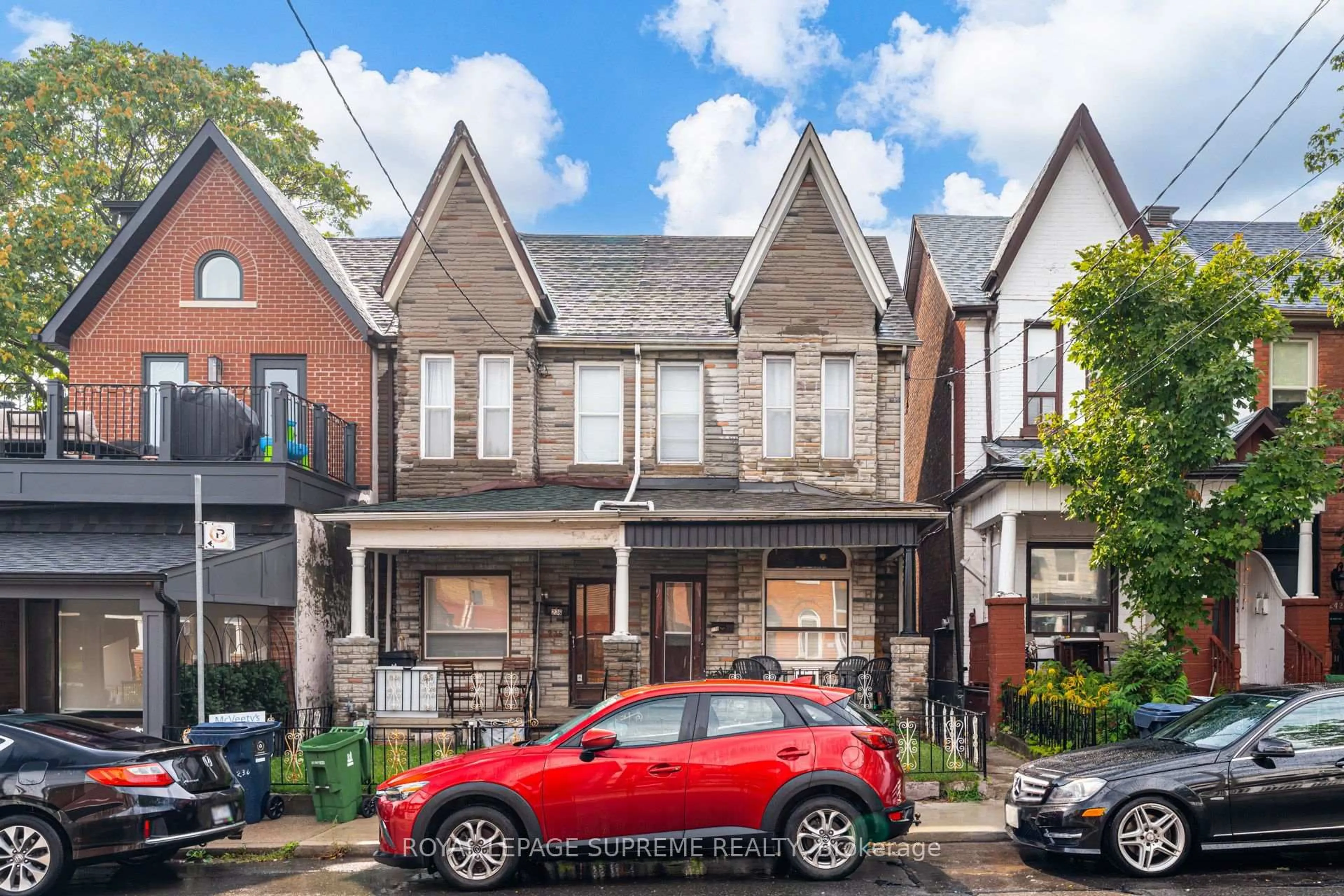 Home with brick exterior material, street for 238 Brock Ave, Toronto Ontario M6K 2M2