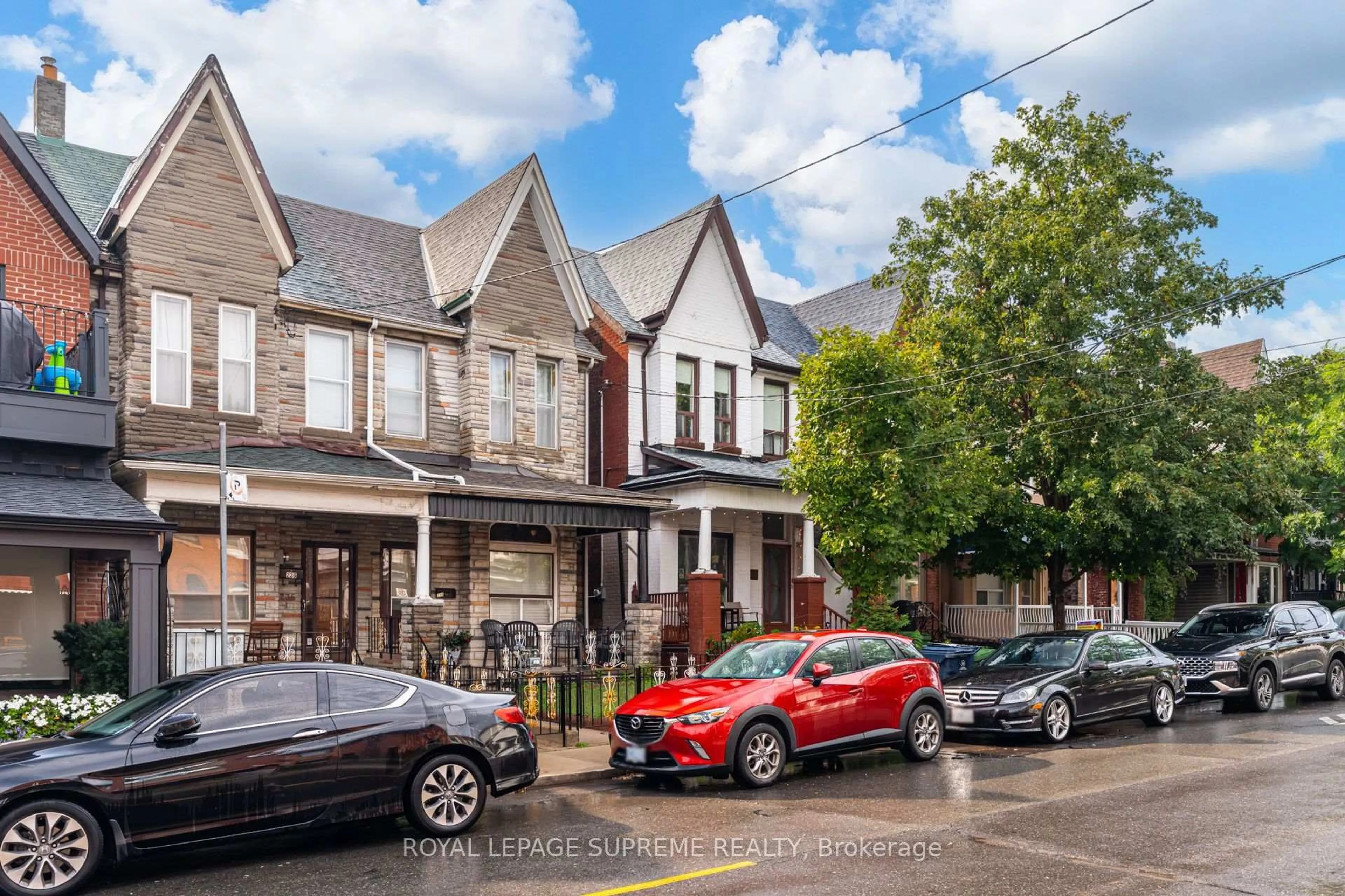 A pic from outside/outdoor area/front of a property/back of a property/a pic from drone, street for 238 Brock Ave, Toronto Ontario M6K 2M2