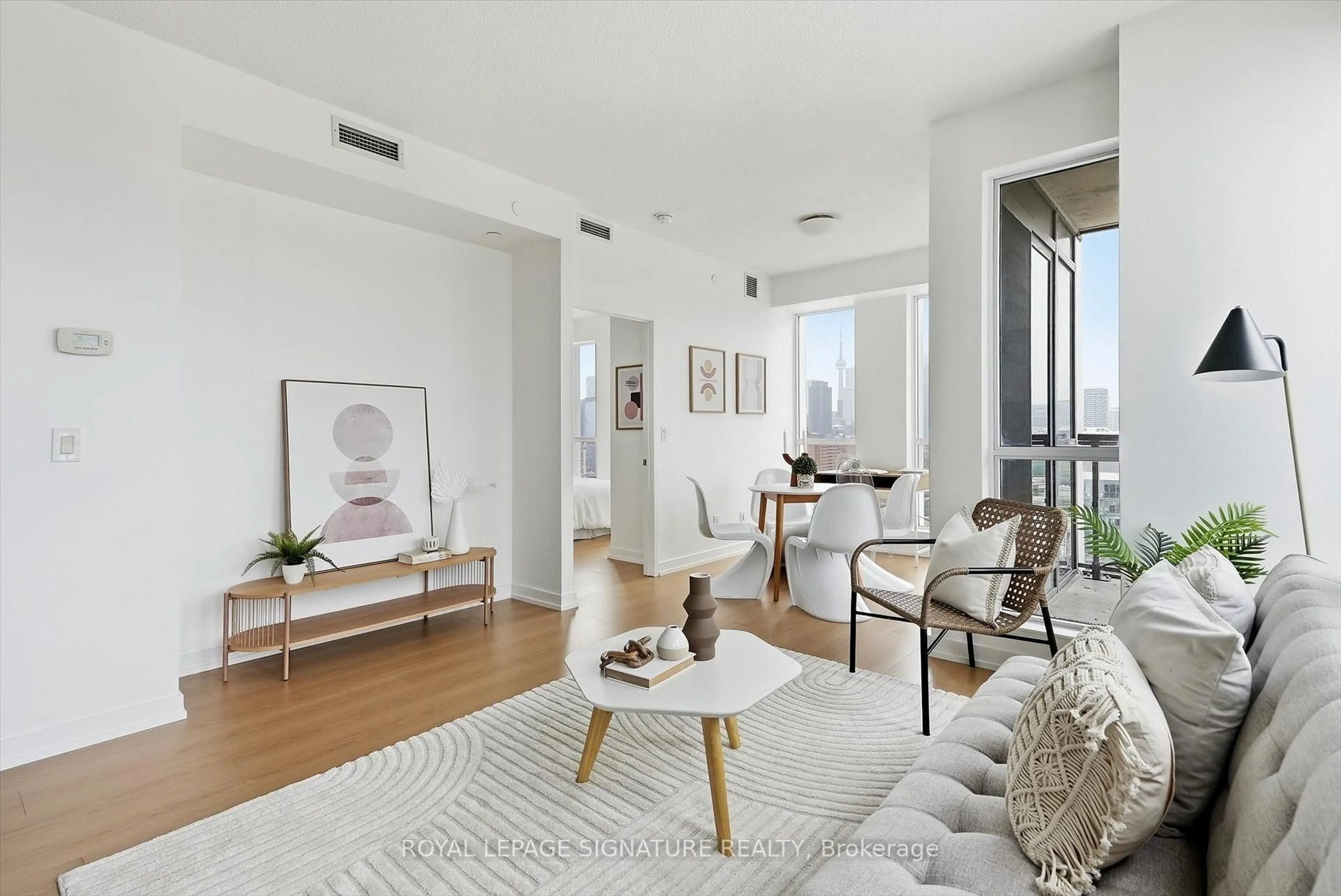 Living room with furniture, unknown for 55 Regent Park Blvd #1809, Toronto Ontario M5A 3H6