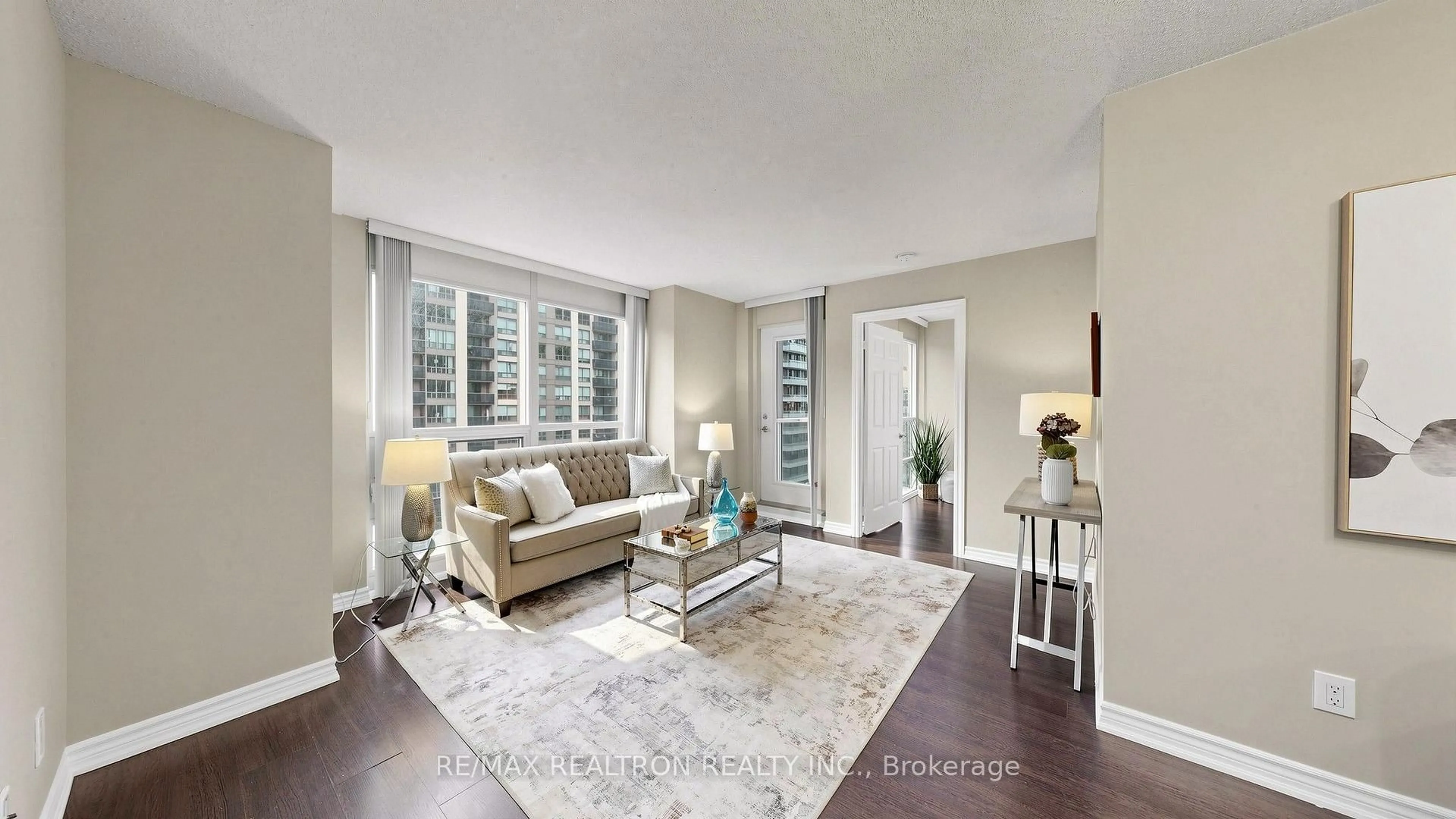 Living room with furniture, wood/laminate floor for 761 Bay St #1212, Toronto Ontario M5G 2R2