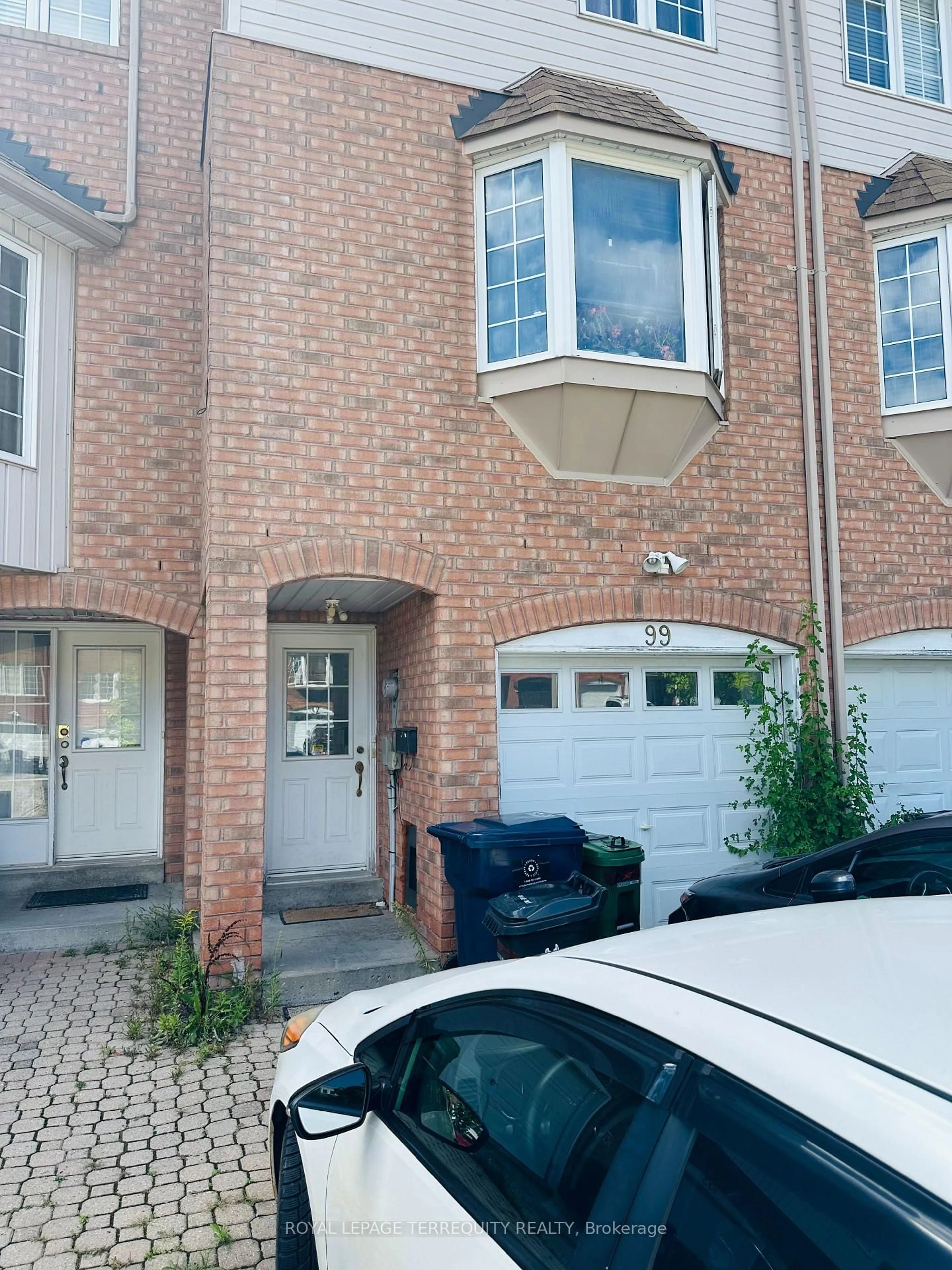 Home with brick exterior material, street for 99 Sufi Cres, Toronto Ontario M4A 2X2