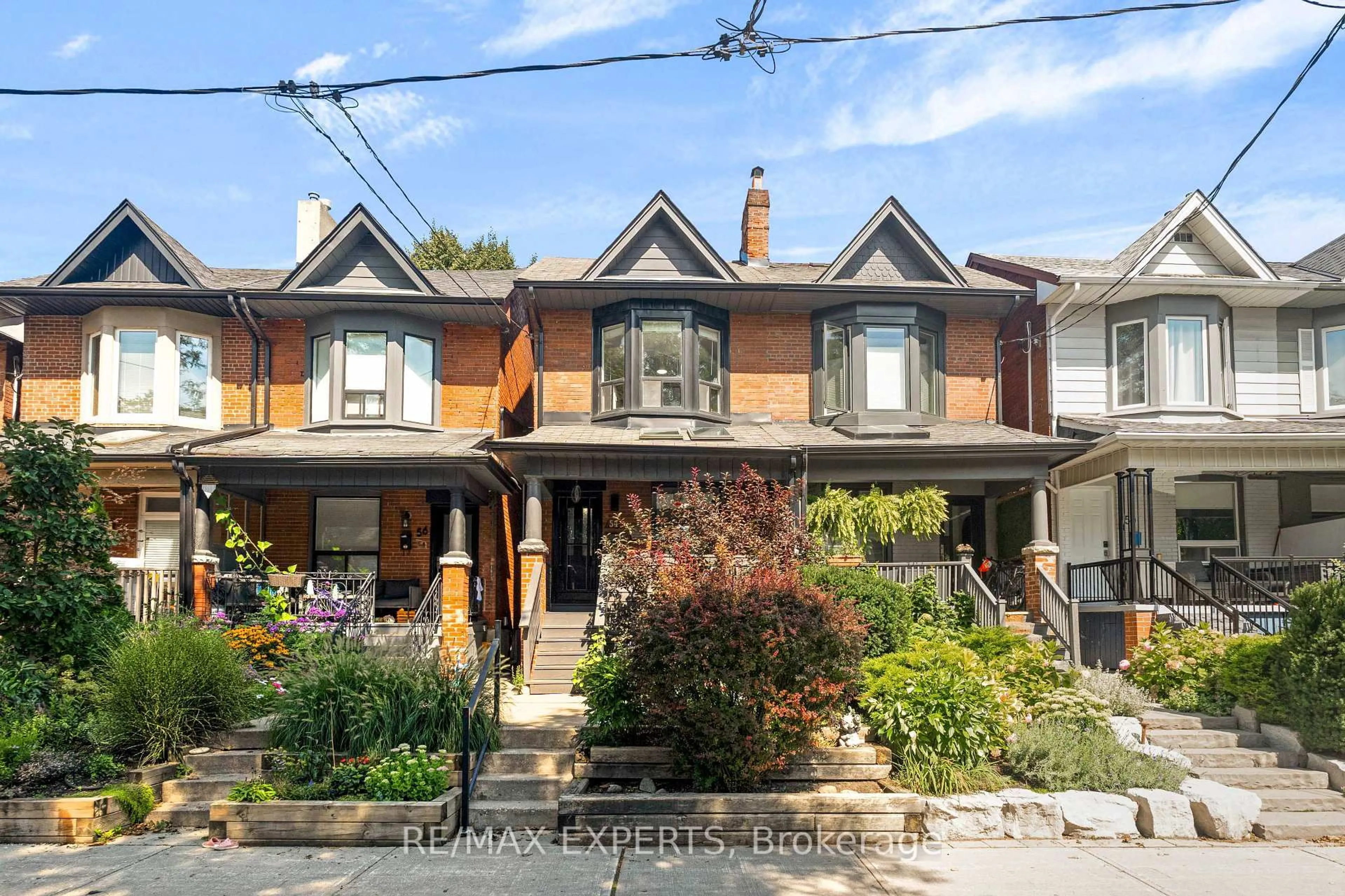 Home with brick exterior material, street for 54 Marchmount Rd, Toronto Ontario M6G 2A9