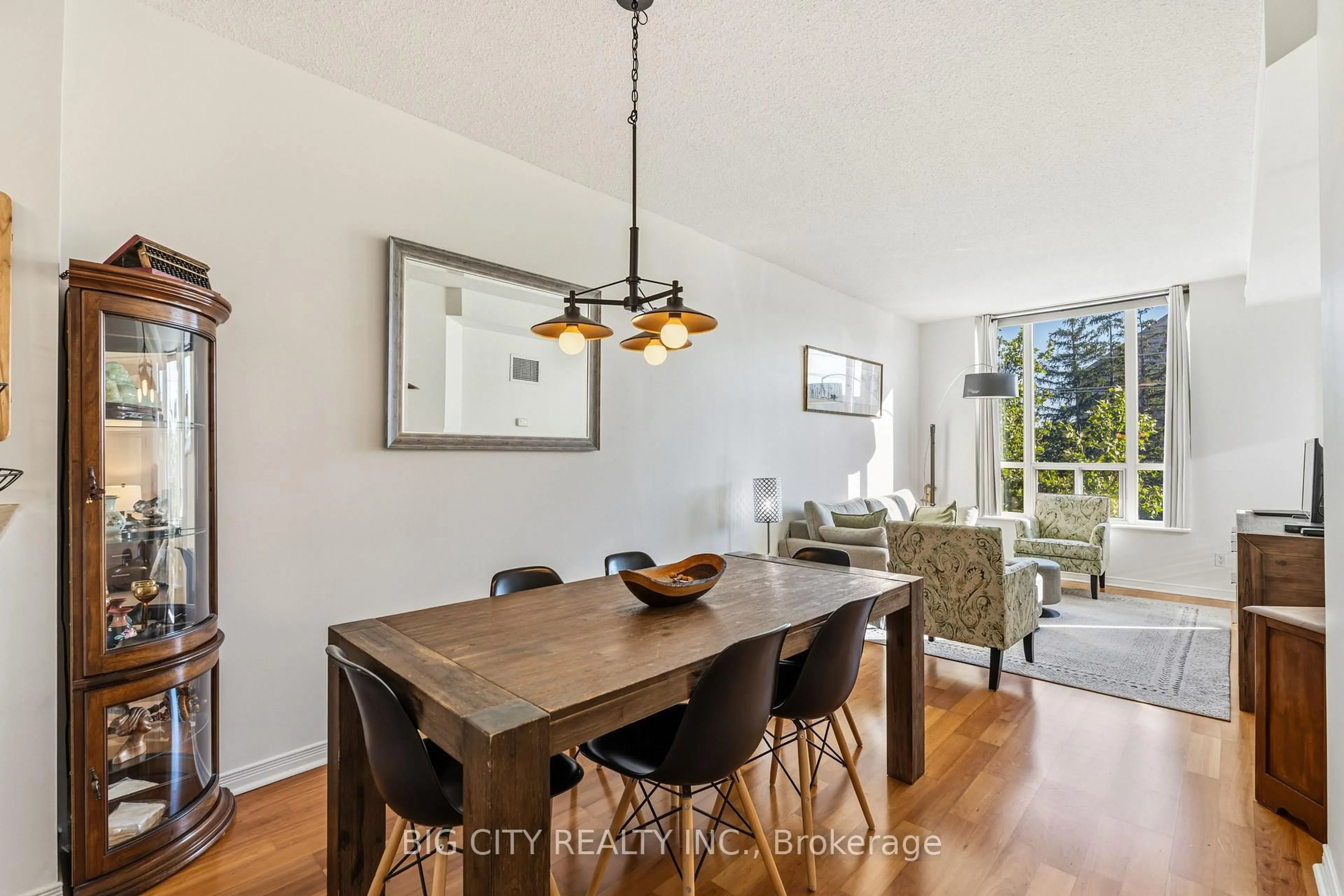 Dining room, wood/laminate floor for 455 Rosewell Ave #412, Toronto Ontario M4R 2H9