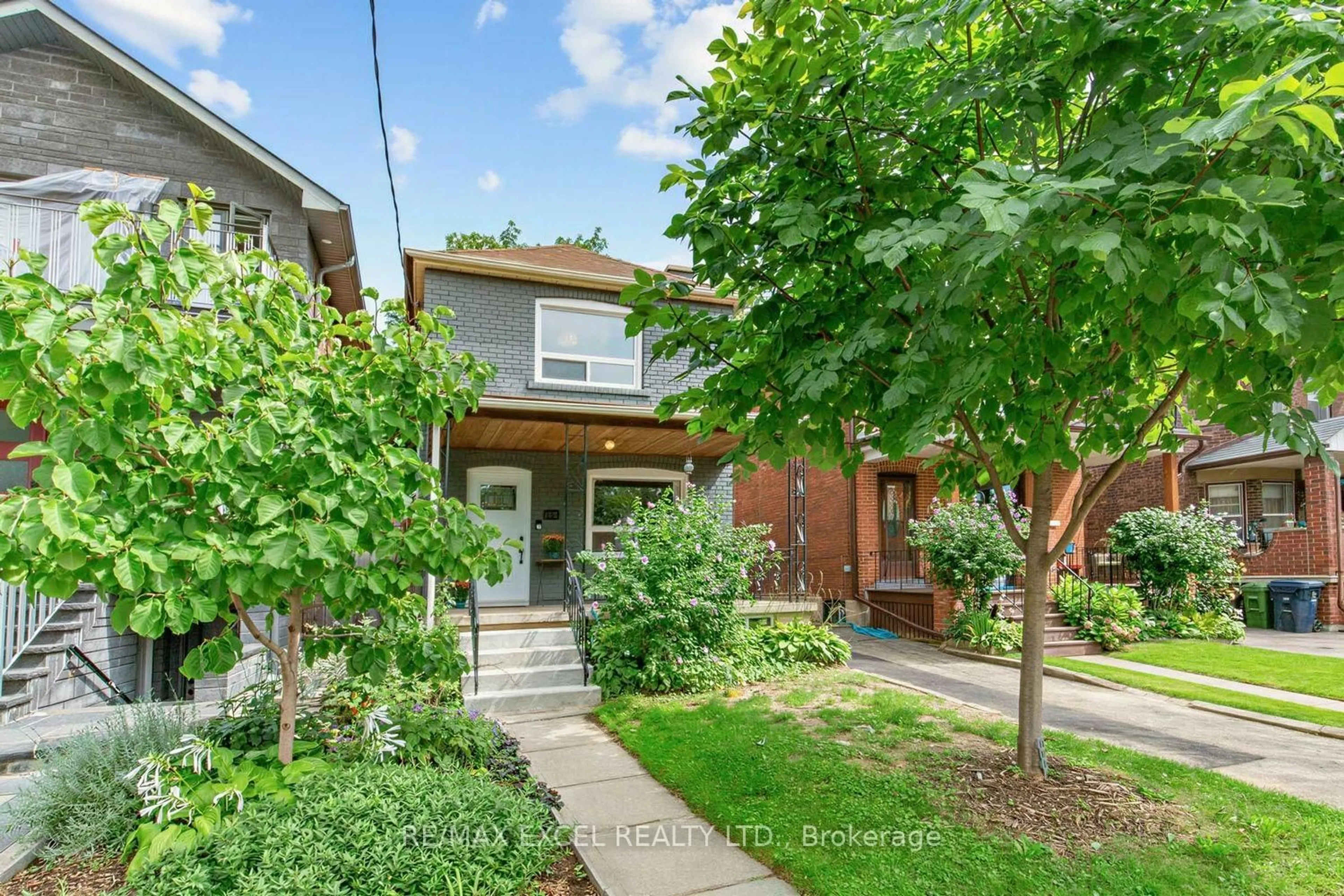 Home with brick exterior material, street for 165 Winona Dr, Toronto Ontario M6G 3T1