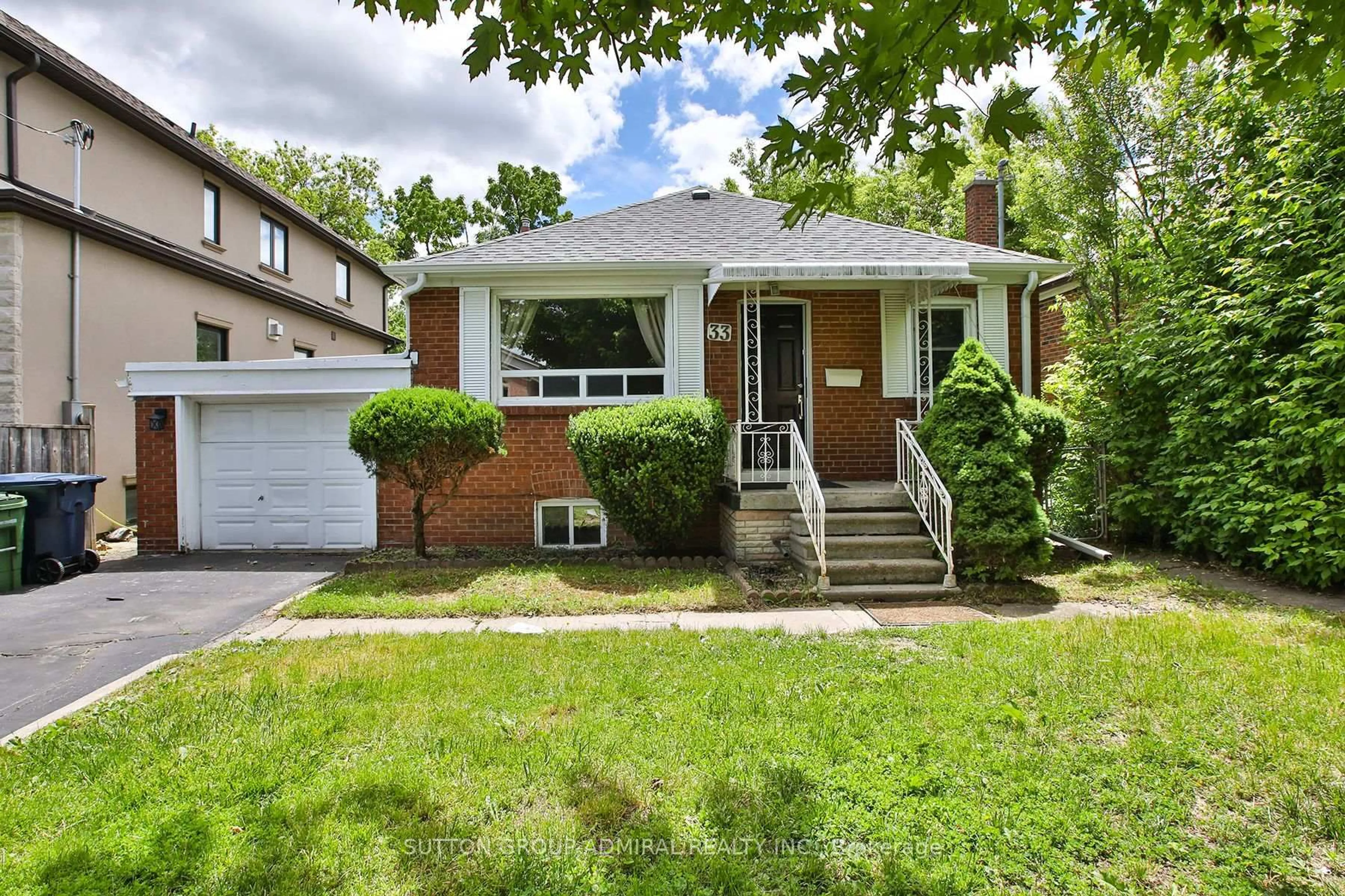 Home with brick exterior material, street for 33 Regina Ave, Toronto Ontario M6A 1R4