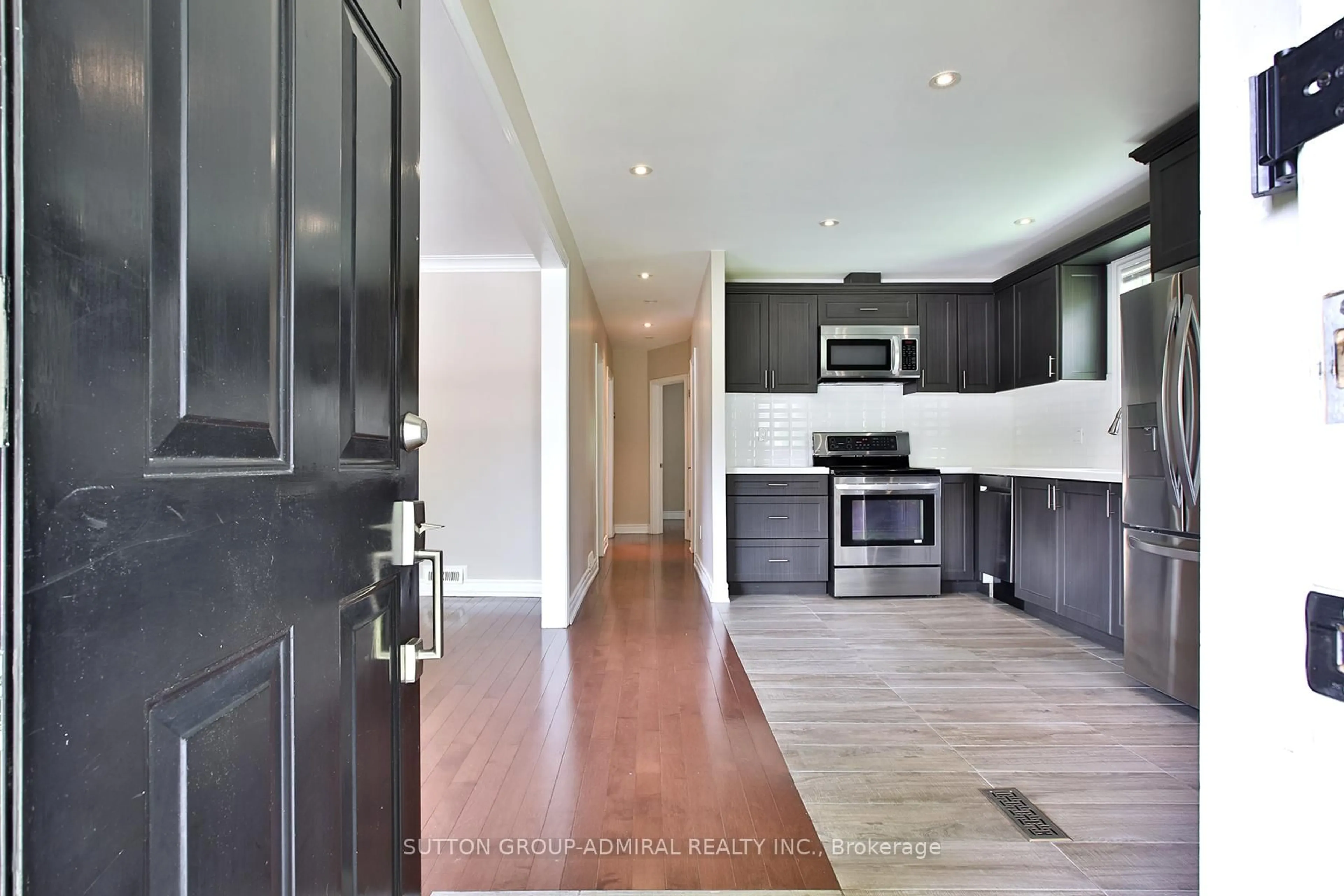 Open concept kitchen, unknown for 33 Regina Ave, Toronto Ontario M6A 1R4