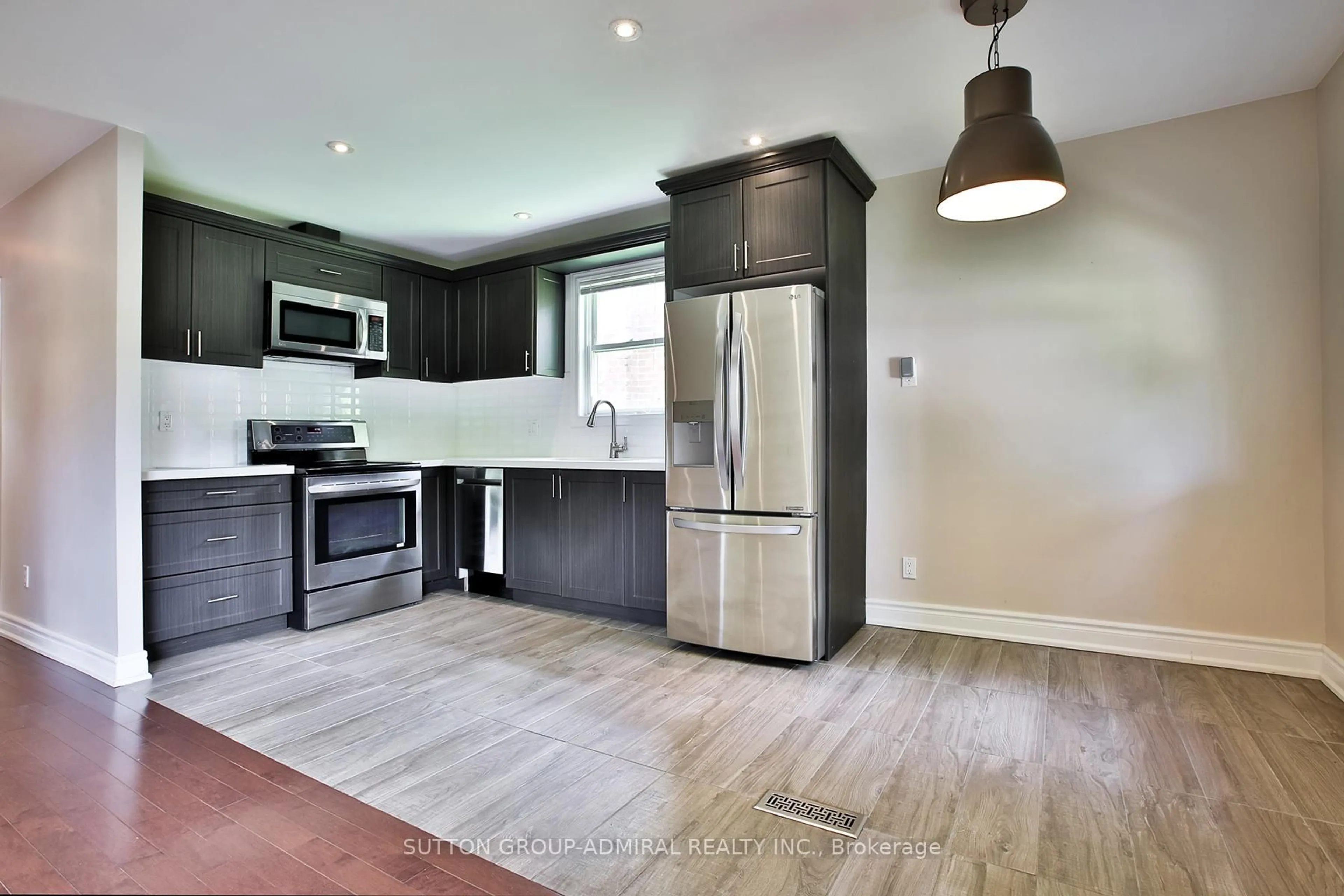 Open concept kitchen, unknown for 33 Regina Ave, Toronto Ontario M6A 1R4